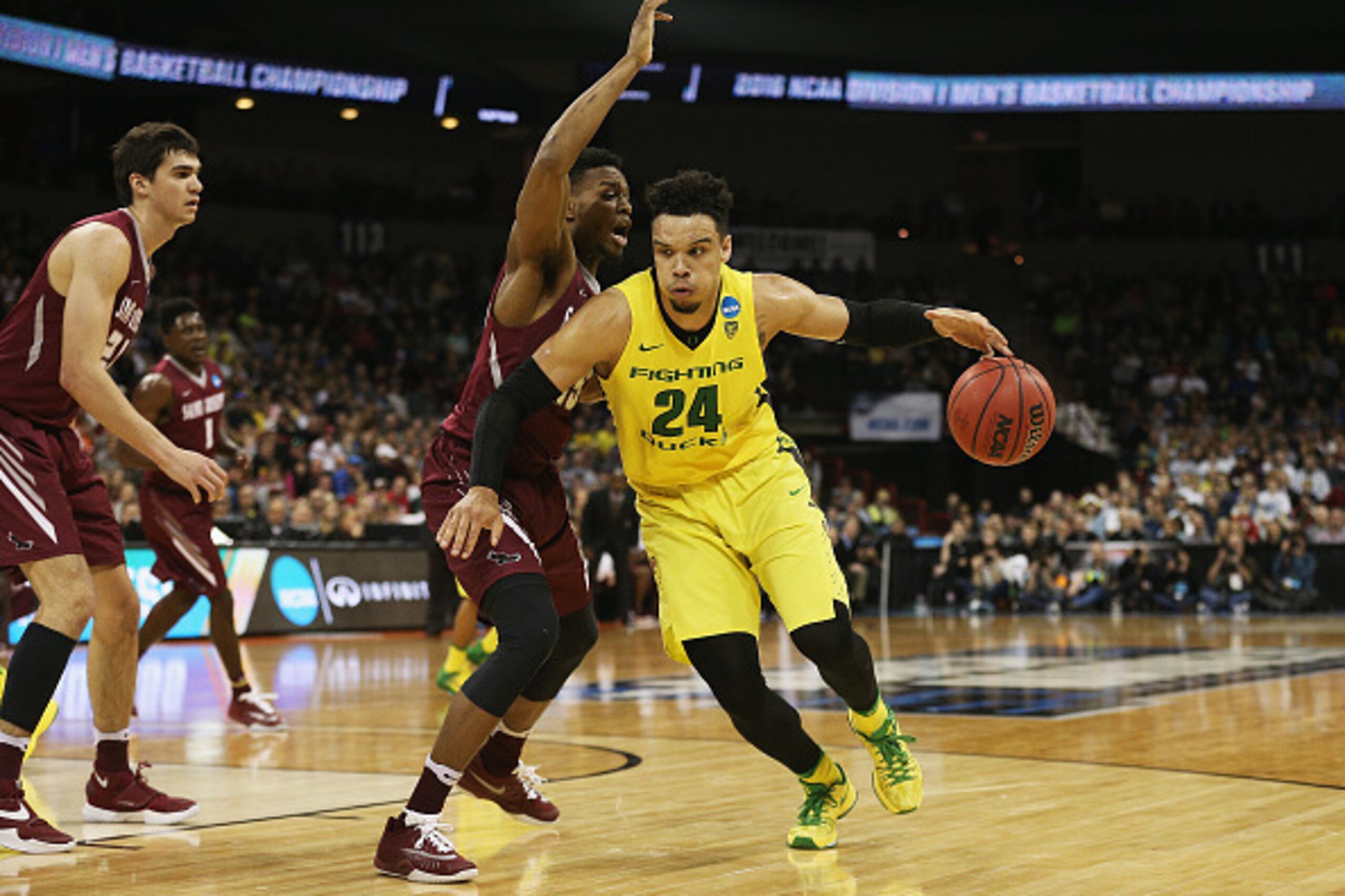 SPOKANE, WA - MARCH 20: Dillon Brooks #24 of the Oregon Ducks drives against James Demery #25 of the Saint Joseph's Hawks in the second half during the second round of the 2016 NCAA Men's Basketball Tournament at Spokane Veterans Memorial Arena on March 2