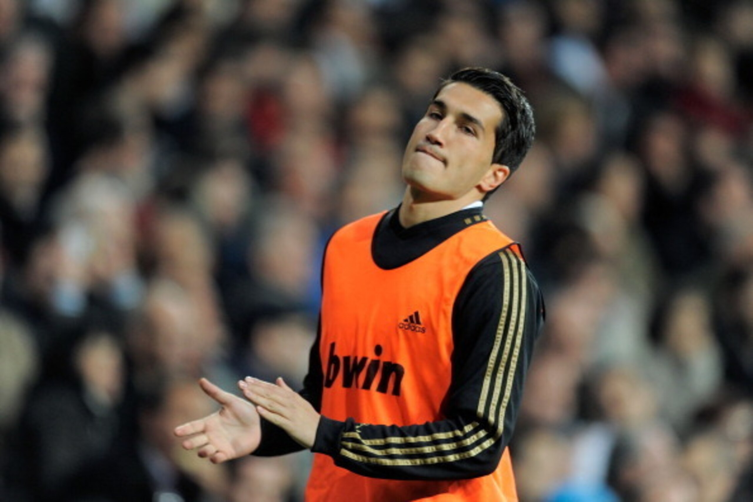 MADRID, SPAIN - MARCH 18: Nuri Sahin of Real Madrid warms up during the La Liga match between Real Madrid CF and Malaga CF at Estadio Santiago Bernabeu on March 18, 2012 in Madrid, Spain.  (Photo by Denis Doyle/Getty Images)