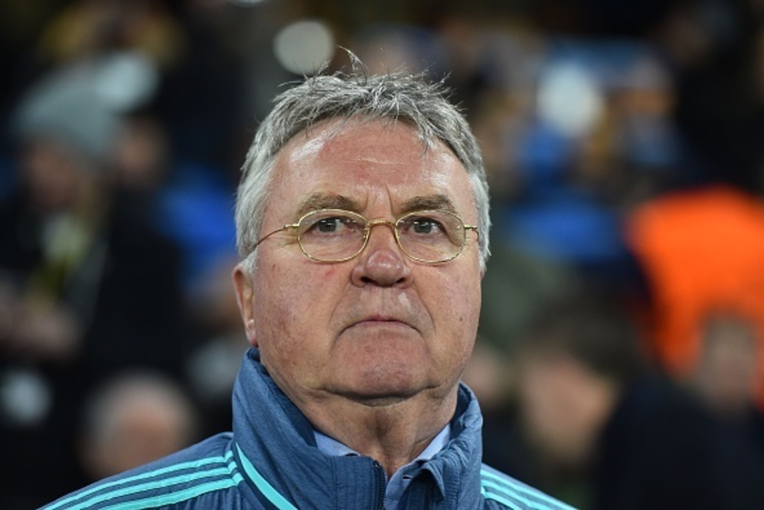 Chelsea's Dutch interim manager Guus Hiddink arrives for the UEFA Champions League round of 16 second leg football match between Chelsea and Paris Saint-Germain (PSG) at Stamford Bridge in London on March 9, 2016.  / AFP / BEN STANSALL        (Photo credi