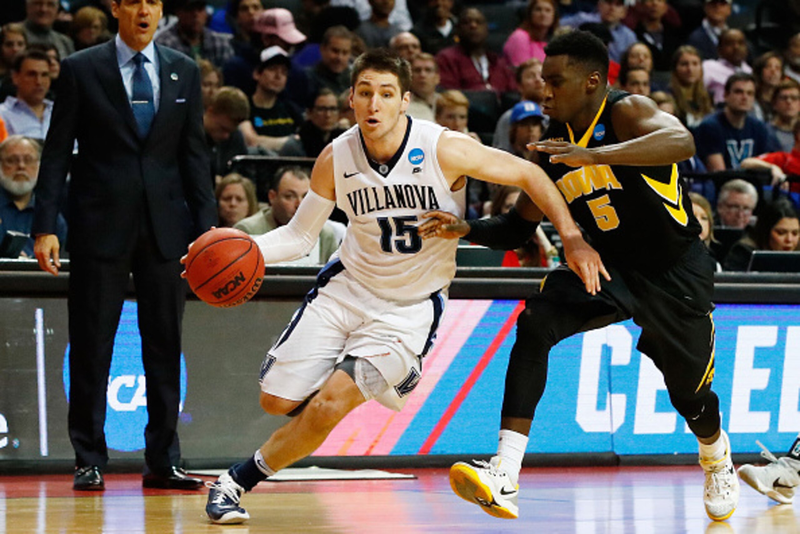 NEW YORK, NY - MARCH 20:  Ryan Arcidiacono #15 of the Villanova Wildcats drives against Anthony Clemmons #5 of the Iowa Hawkeyes in the second half during the second round of the 2016 NCAA Men's Basketball Tournament at Barclays Center on March 20, 2016 i