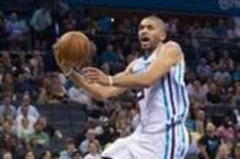 Mar 16, 2016; Charlotte, NC, USA; Charlotte Hornets forward Nicolas Batum (5) goes up for a shot in the second half against the Orlando Magic at Time Warner Cable Arena. The Hornets defeated the Magic 107-99. Mandatory Credit: Jeremy Brevard-USA TODAY Spo