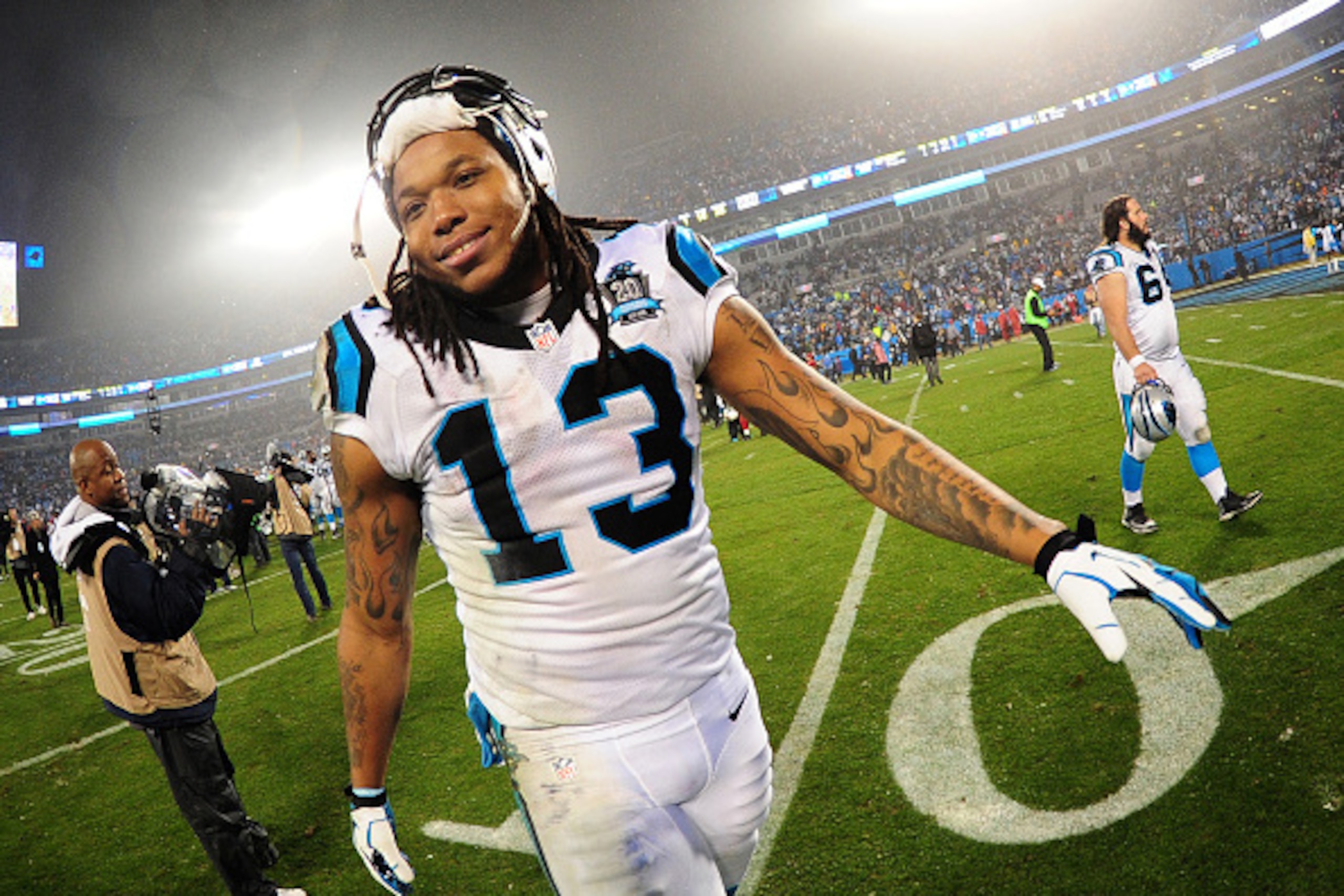 CHARLOTTE, NC - JANUARY 3: Kelvin Benjamin #13 of the Carolina Panthers celebrates after the NFC Wild Card Playoff game against the Arizona Cardinals  on January 3, 2015 at Bank of America Stadium in Charlotte, North Carolina.  (Photo by Scott Cunningham/