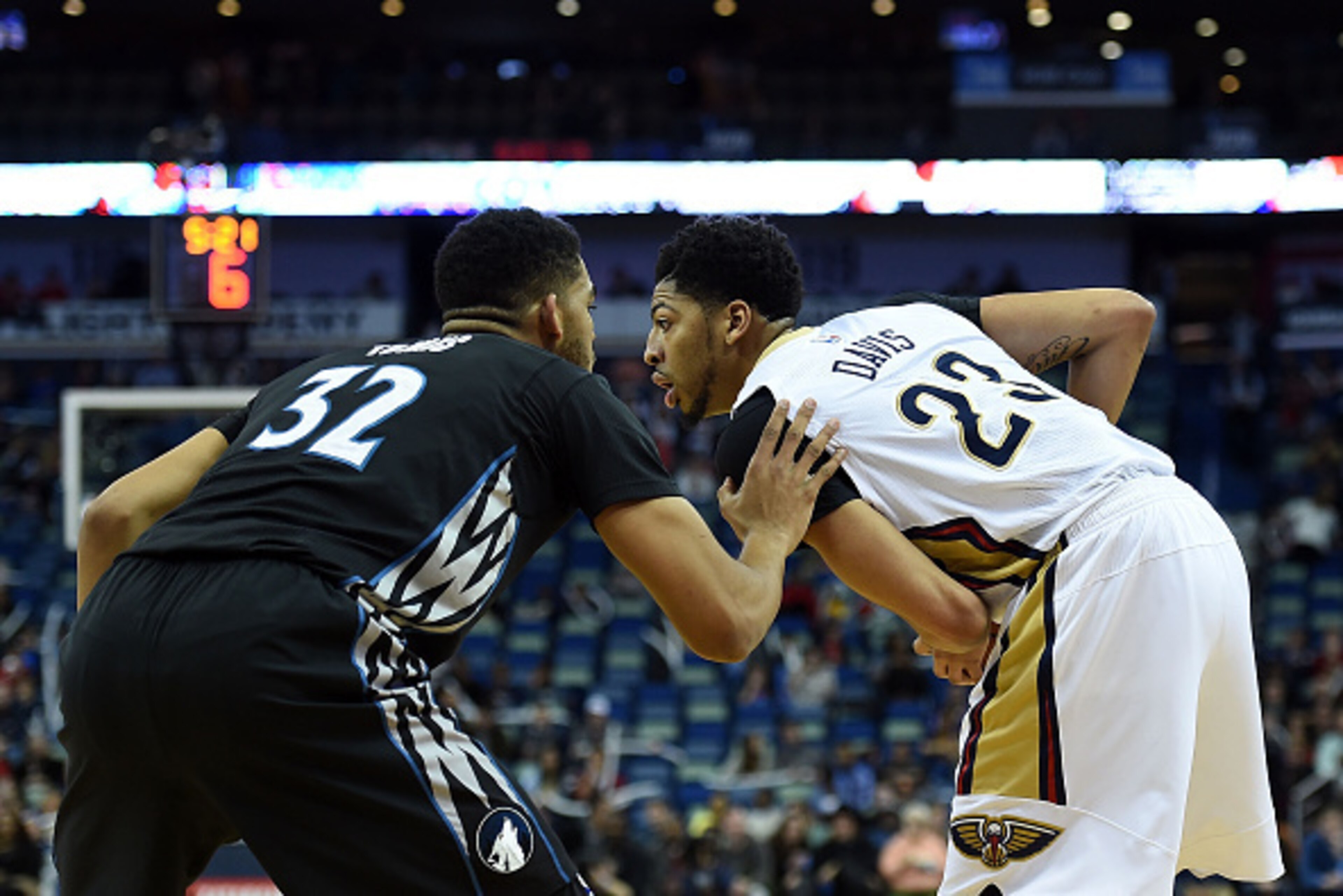 NEW ORLEANS, LA - JANUARY 19: Anthony Davis #23 of the New Orleans Pelicans works against Karl-Anthony Towns #32 of the Minnesota Timberwolves during the first half of a game at the Smoothie King Center on January 19, 2016 in New Orleans, Louisiana. New NEW ORLEANS, LA - JANUARY 19: Anthony Davis #23 of the New Orleans Pelicans works against Karl-Anthony Towns #32 of the Minnesota Timberwolves during the first half of a game at the Smoothie King Center on January 19, 2016 in New Orleans, Louisiana. New