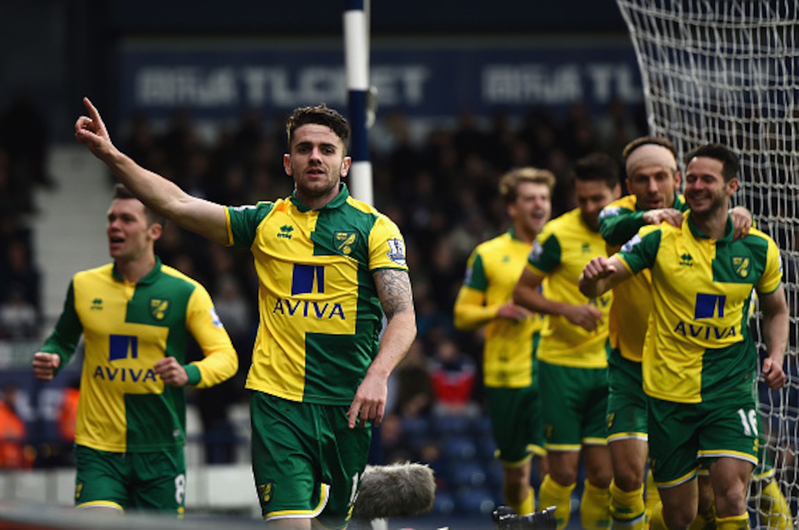 WEST BROMWICH, ENGLAND - MARCH 19: Robbie Brady of Norwich City celebrates scoring his team's first goal during the Barclays Premier League match between West Bromwich Albion and Norwich City at The Hawthorns on March 19, 2016 in West Bromwich, United Ki WEST BROMWICH, ENGLAND - MARCH 19: Robbie Brady of Norwich City celebrates scoring his team's first goal during the Barclays Premier League match between West Bromwich Albion and Norwich City at The Hawthorns on March 19, 2016 in West Bromwich, United Ki