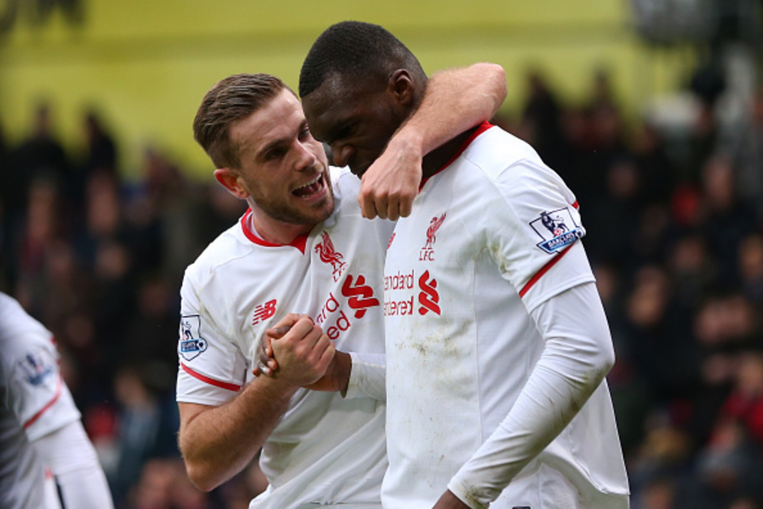 LONDON, ENGLAND - MARCH 06: Captain Jordan Henderson of Liverpool celebrates with Christian Benteke of Liverpool after he scores a penalty to make it 1-2 during the Barclays Premier League match between Crystal Palace and Liverpool at Selhurst Park on Ma LONDON, ENGLAND - MARCH 06: Captain Jordan Henderson of Liverpool celebrates with Christian Benteke of Liverpool after he scores a penalty to make it 1-2 during the Barclays Premier League match between Crystal Palace and Liverpool at Selhurst Park on Ma