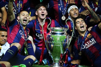 BERLIN, GERMANY - JUNE 06:  Javier Mascherano, Lionel Messi,Neymar Jr and Luis Suarez pose with the trophy during the UEFA Champions League Final between Barcelona and Juventus at Olympiastadion on June 6, 2015 in Berlin, Germany. (Photo by Ian MacNicol/G