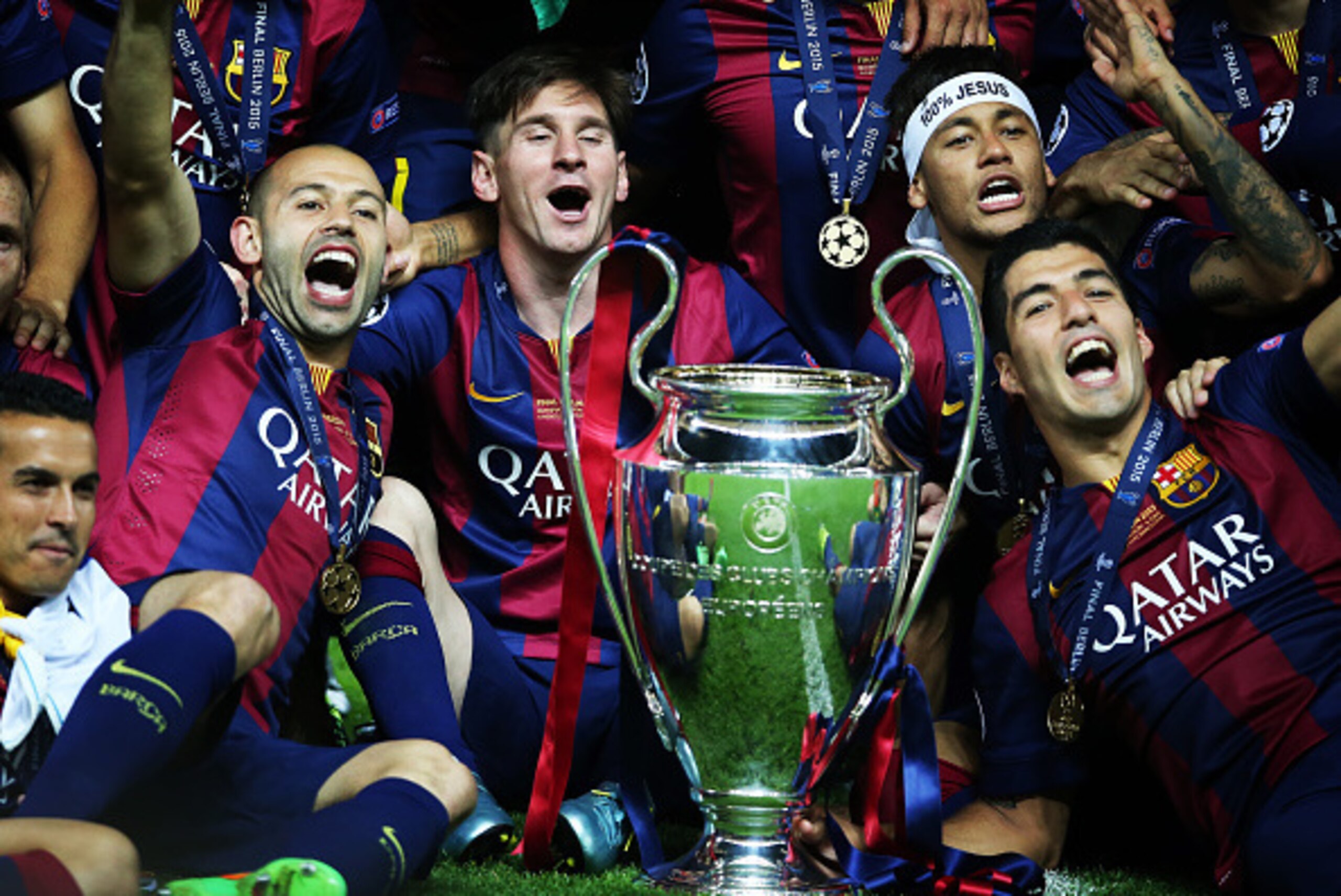 BERLIN, GERMANY - JUNE 06:  Javier Mascherano, Lionel Messi,Neymar Jr and Luis Suarez pose with the trophy during the UEFA Champions League Final between Barcelona and Juventus at Olympiastadion on June 6, 2015 in Berlin, Germany. (Photo by Ian MacNicol/G