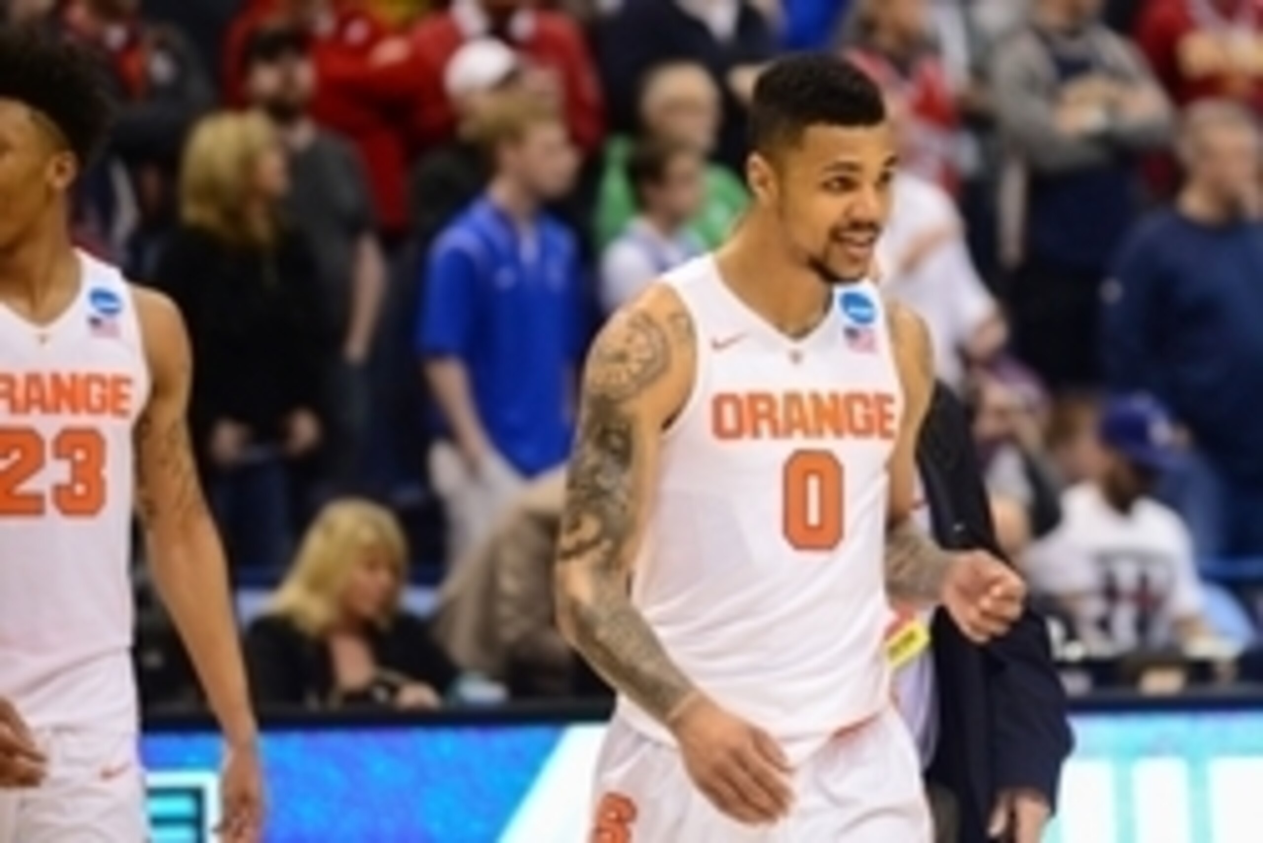 Mar 20, 2016; St. Louis, MO, USA; Syracuse Orange forward Michael Gbinije (0) reacts after the game against the Middle Tennessee Blue Raiders in the second round in the 2016 NCAA Tournament at Scottrade Center. Syracuse won 75-50. Mandatory Credit: Jeff C