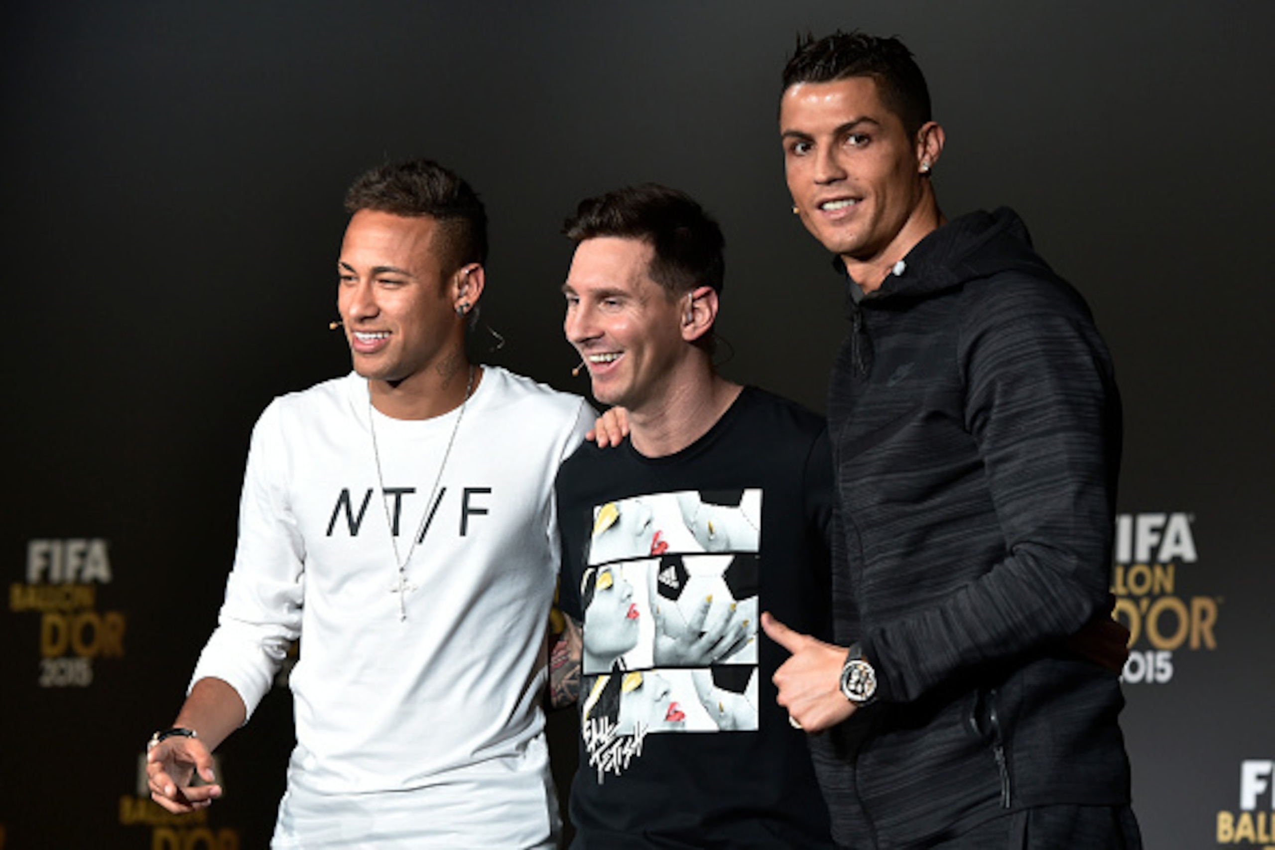 (From L) FC Barcelona and Brazils forward Neymar, FC Barcelona and Argentina's forward Lionel Messi and Real Madrid and Portugal's forward Cristiano Ronaldo pose after a press conference ahead of the 2015 FIFA Ballon d'Or award ceremony at the Kongresshau