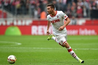 Cologne's defender Jonas Hector runs with the ball during the German first division Bundesliga football match FC Cologne vs Borussia Moenchengladbach in Cologne, western Germany on September 19, 2015. Cologne won the match 1-0.    AFP PHOTO / PATRIK STOLL