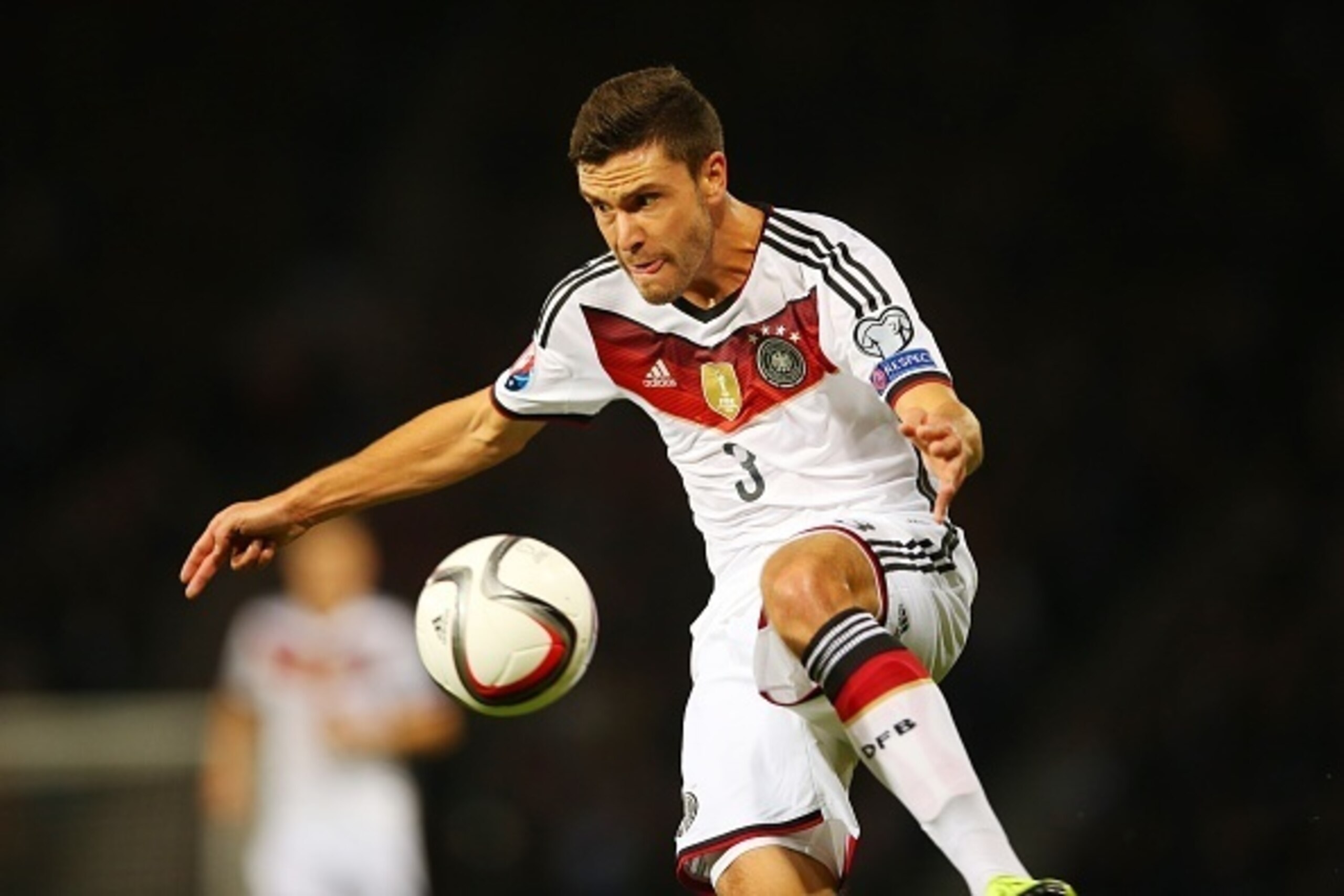 Jonas Hector of Germany controls the ball during the UEFA Euro 2016 qualifier between Scotland and Germany at Hampden Park in Glasgow, Scotland, on September 7, 2015. AFP PHOTO / IAN MACNICOL        (Photo credit should read Ian MacNicol/AFP/Getty Images)