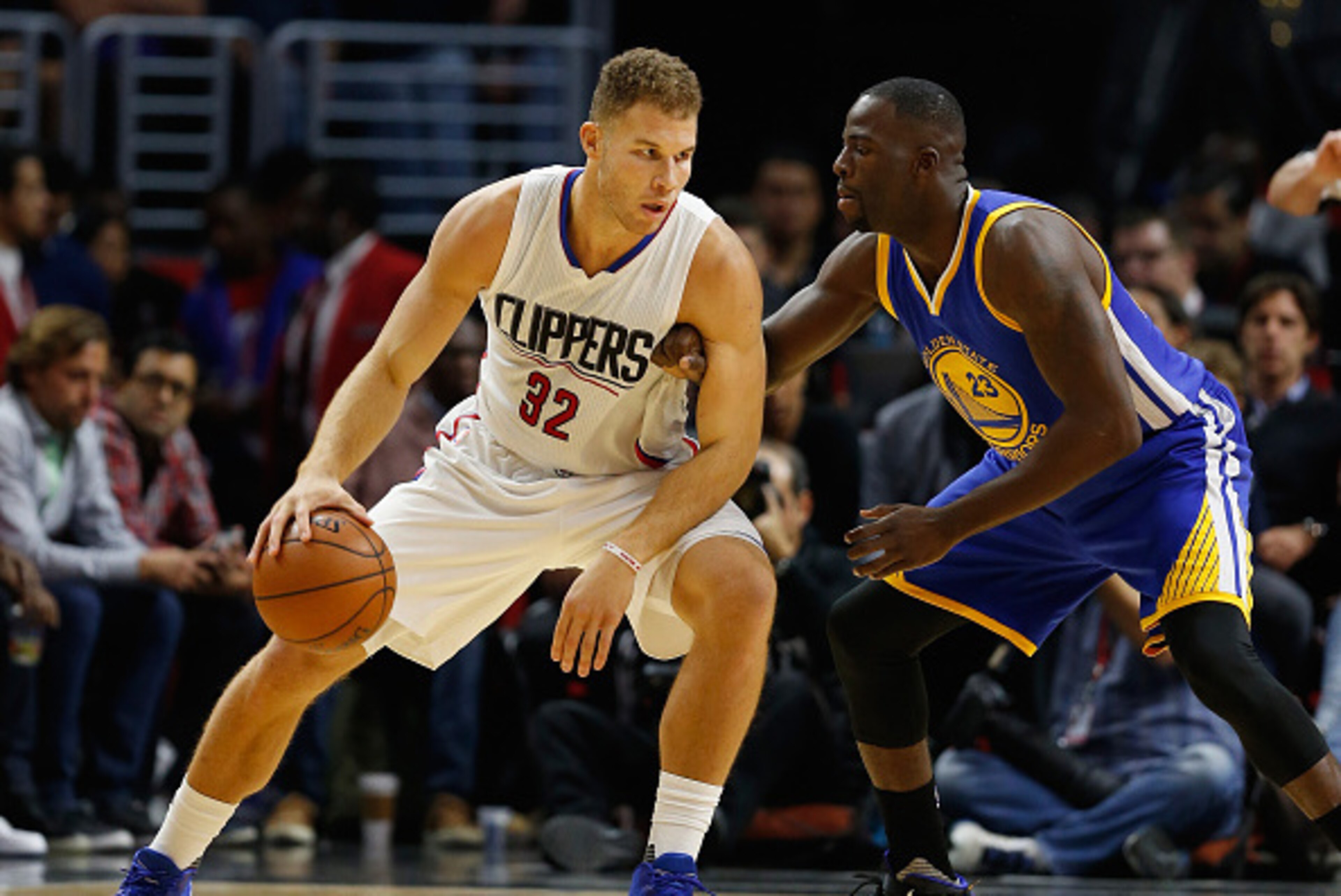LOS ANGELES, CA - NOVEMBER 19: Blake Griffin #32 of the Los Angeles Clippers dribbles against Draymond Green #23 of the Golden State Warriors during a game at Staples Center on November 19, 2015 in Los Angeles, California. NOTE TO USER: User expressly ack