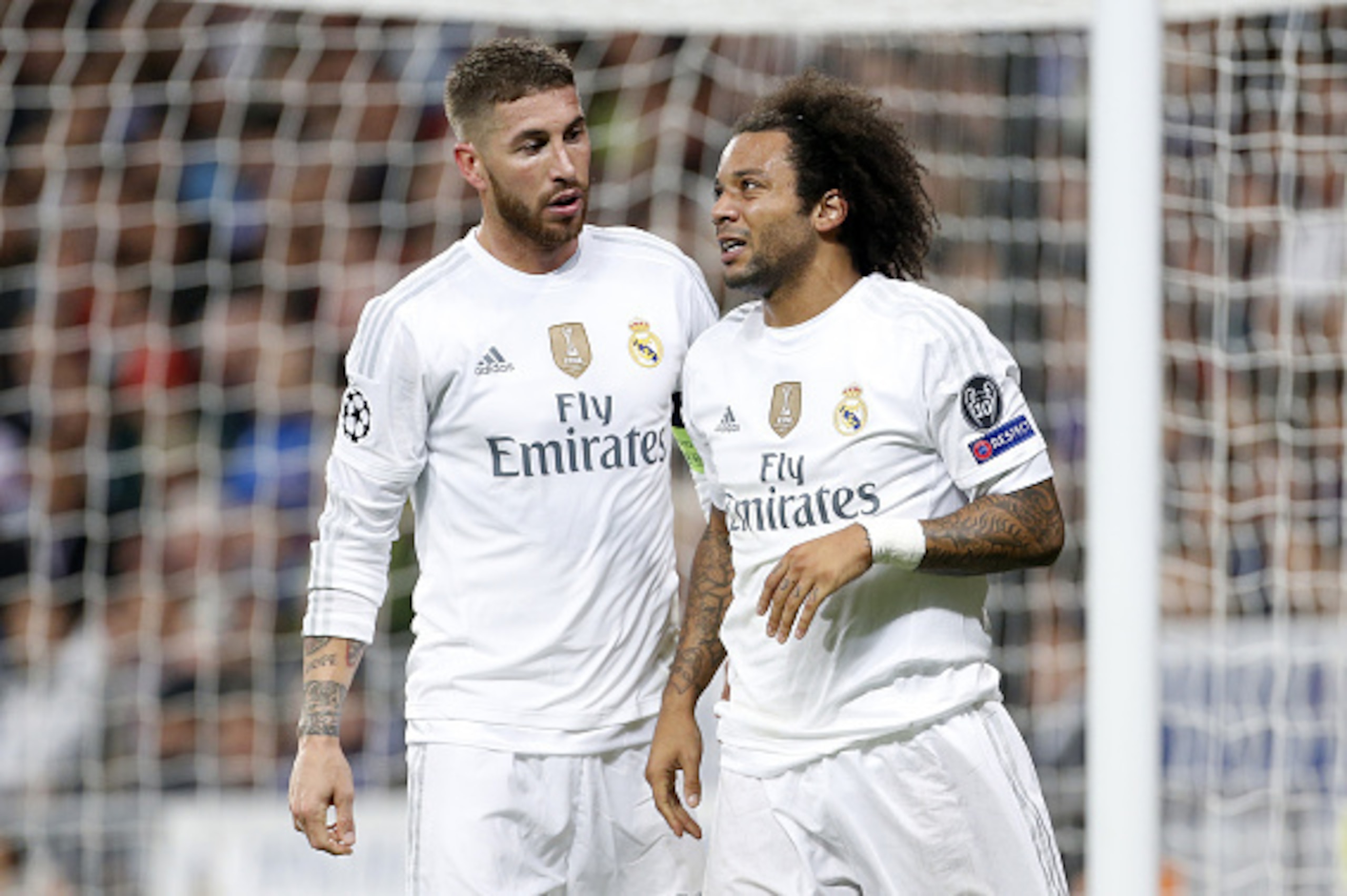 MADRID, SPAIN - NOVEMBER 3: Sergio Ramos talks to Marcelo of Real Madrid during the UEFA Champions League match between Real Madrid and Paris Saint-Germain (PSG) at Santiago Bernabeu stadium on November 3, 2015 in Madrid, Spain. (Photo by Jean Catuffe/Get
