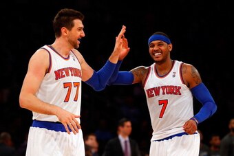 NEW YORK, NY - DECEMBER 06:  (NEW YORK DAILIES OUT)    Carmelo Anthony #7 and Andrea Bargnani #77 of the New York Knicks in action against the Orlando Magic at Madison Square Garden on December 6, 2013 in New York City. The Knicks defeated the Magic 121-8