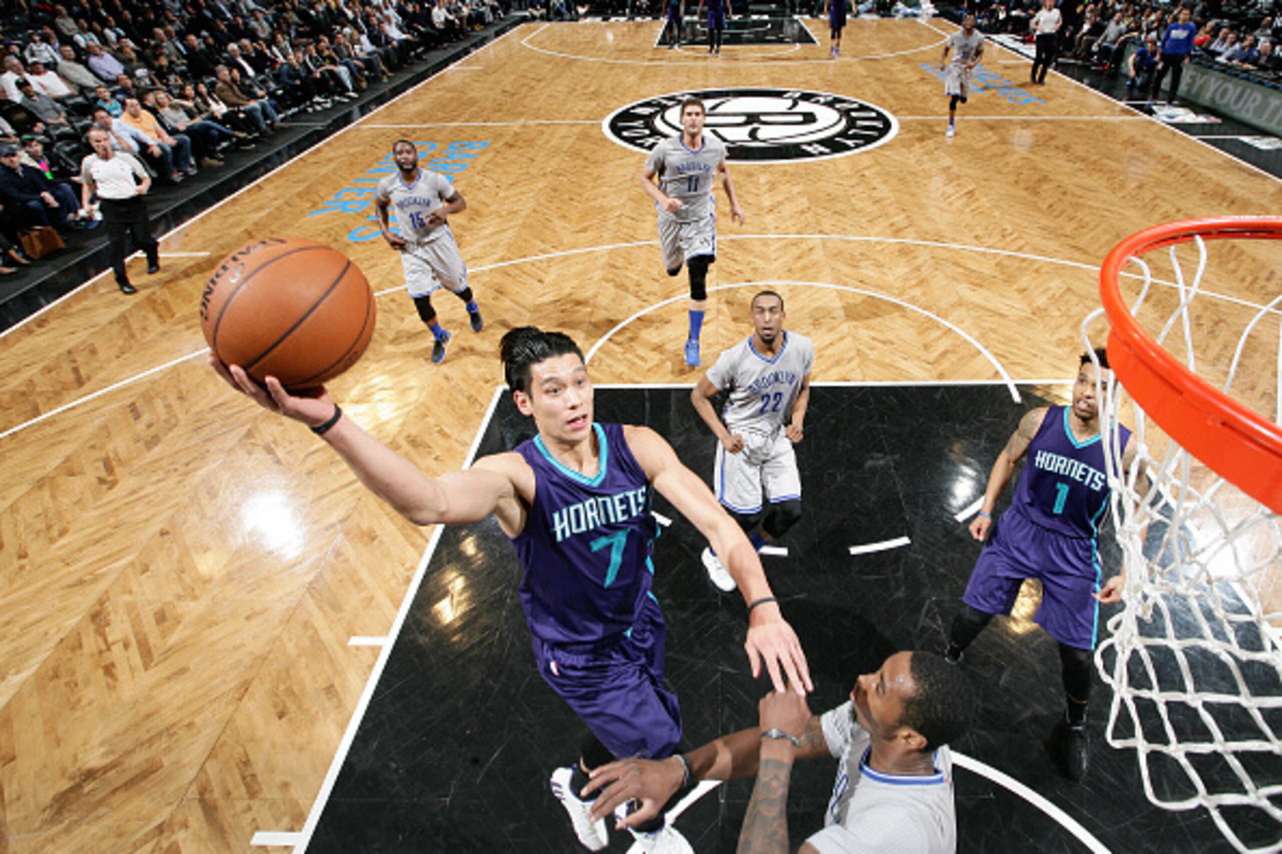 BROOKLYN, NY  - MARCH 22: Jeremy Lin #7 of the Charlotte Hornets goes for the lay up against the Brooklyn Nets during the game on March 22, 2016 at Barclays Center in Brooklyn, New York. NOTE TO USER: User expressly acknowledges and agrees that, by downlo