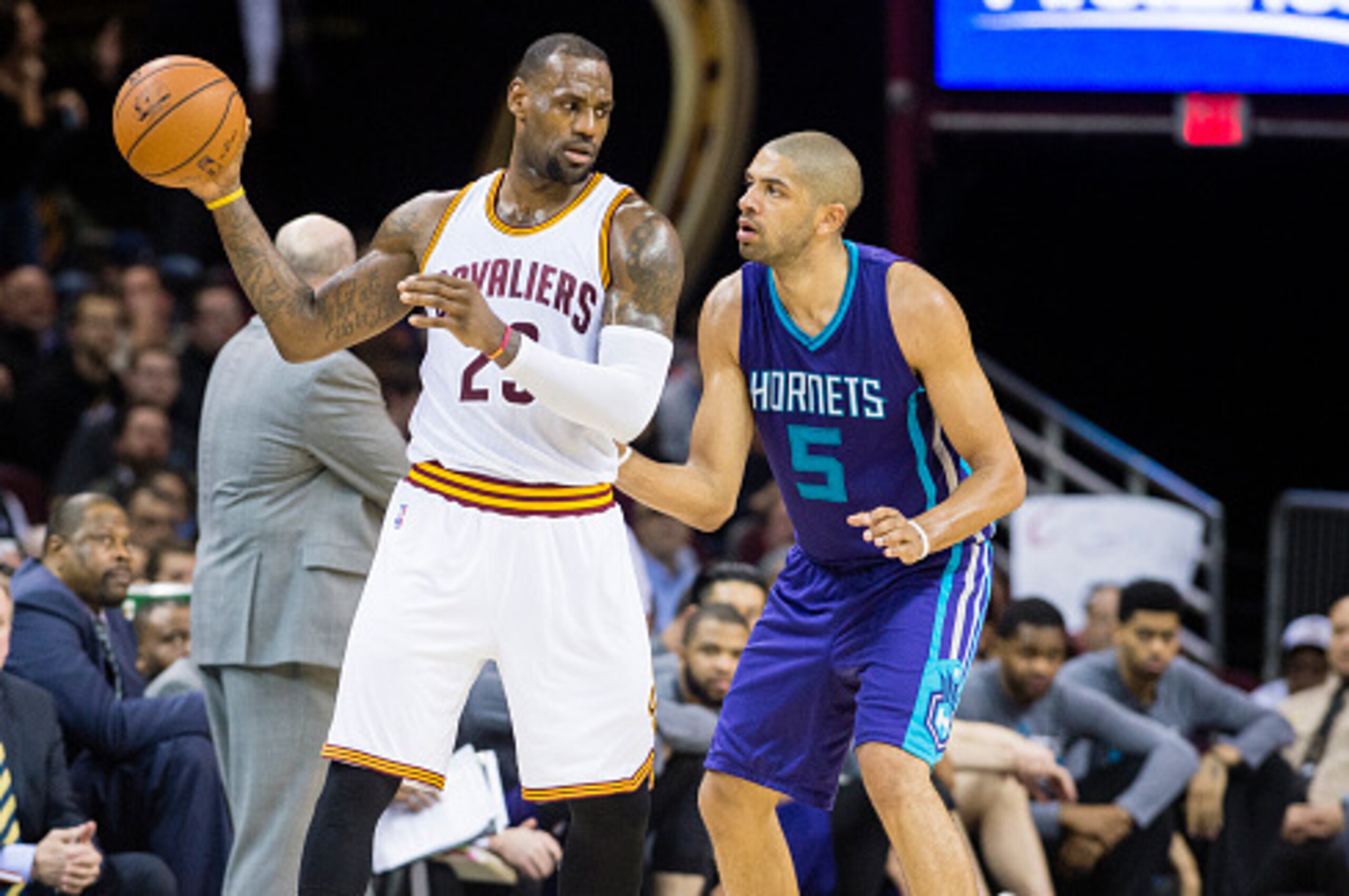 CLEVELAND, OH - FEBRUARY 24: LeBron James #23 of the Cleveland Cavaliers posts up against Nicolas Batum #5 of the Charlotte Hornets during the second half at Quicken Loans Arena on February 24, 2016 in Cleveland, Ohio. The Cavaliers defeated the Hornets 1 CLEVELAND, OH - FEBRUARY 24: LeBron James #23 of the Cleveland Cavaliers posts up against Nicolas Batum #5 of the Charlotte Hornets during the second half at Quicken Loans Arena on February 24, 2016 in Cleveland, Ohio. The Cavaliers defeated the Hornets 1