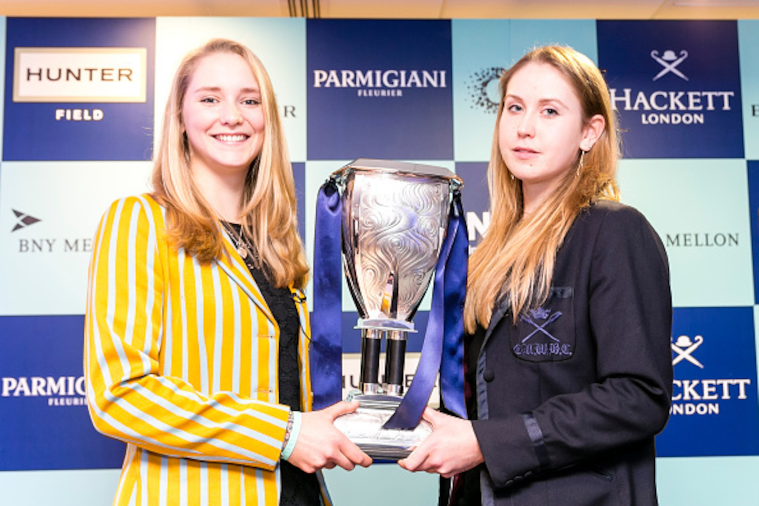 LONDON, ENGLAND - OCTOBER 22:  (L-R)  Hannah Roberts President of Cambridge University Women's Boat Club and Maddy Badcott President of Oxford Women's University Boat Club take part in the official challenge during the BNY Mellon University Boat Race and 