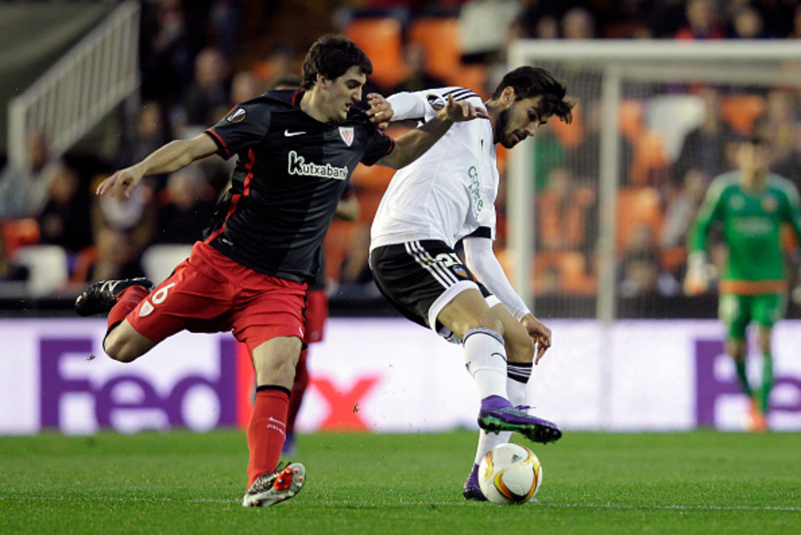 Athletic's midfielder Mikel San Jose (L) vies with Valencia's Portuguese midfielder Andre Gomes during the UEFA Europa League round of 16 second leg football match between Valencia CF vs Athletic Club de Bilbao at the Mestalla stadium in Valencia on March Athletic's midfielder Mikel San Jose (L) vies with Valencia's Portuguese midfielder Andre Gomes during the UEFA Europa League round of 16 second leg football match between Valencia CF vs Athletic Club de Bilbao at the Mestalla stadium in Valencia on March