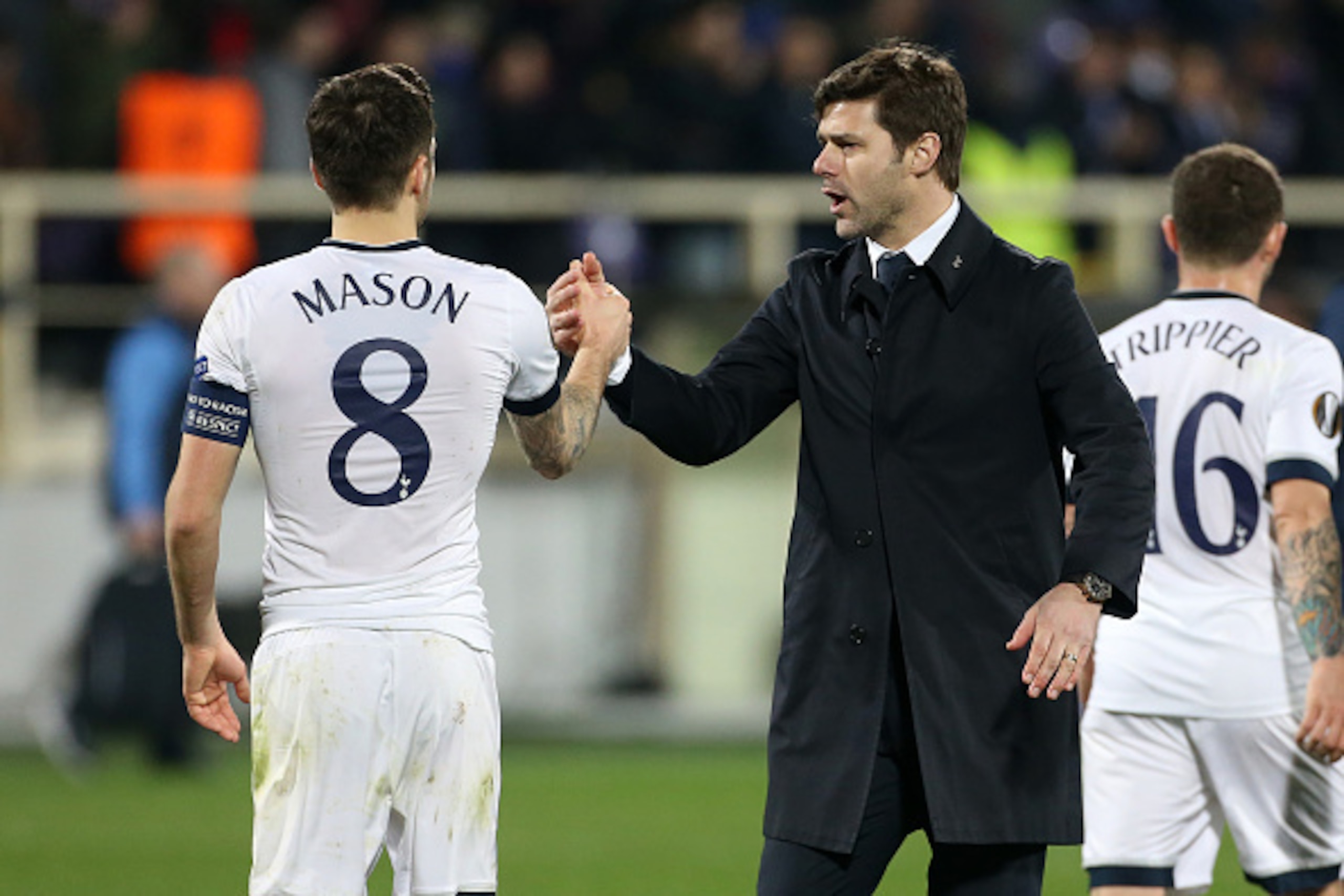dFLORENCE - FEBRUARY 18: Coach of Tottenham Mauricio Pochettino greets Ryan Mason following the UEFA Europa League round of 32 first leg match between Fiorentina and Tottenham Hotspur at Stadio Artemio Franchi on February 18, 2016 in Florence, Italy. (Pho dFLORENCE - FEBRUARY 18: Coach of Tottenham Mauricio Pochettino greets Ryan Mason following the UEFA Europa League round of 32 first leg match between Fiorentina and Tottenham Hotspur at Stadio Artemio Franchi on February 18, 2016 in Florence, Italy. (Pho