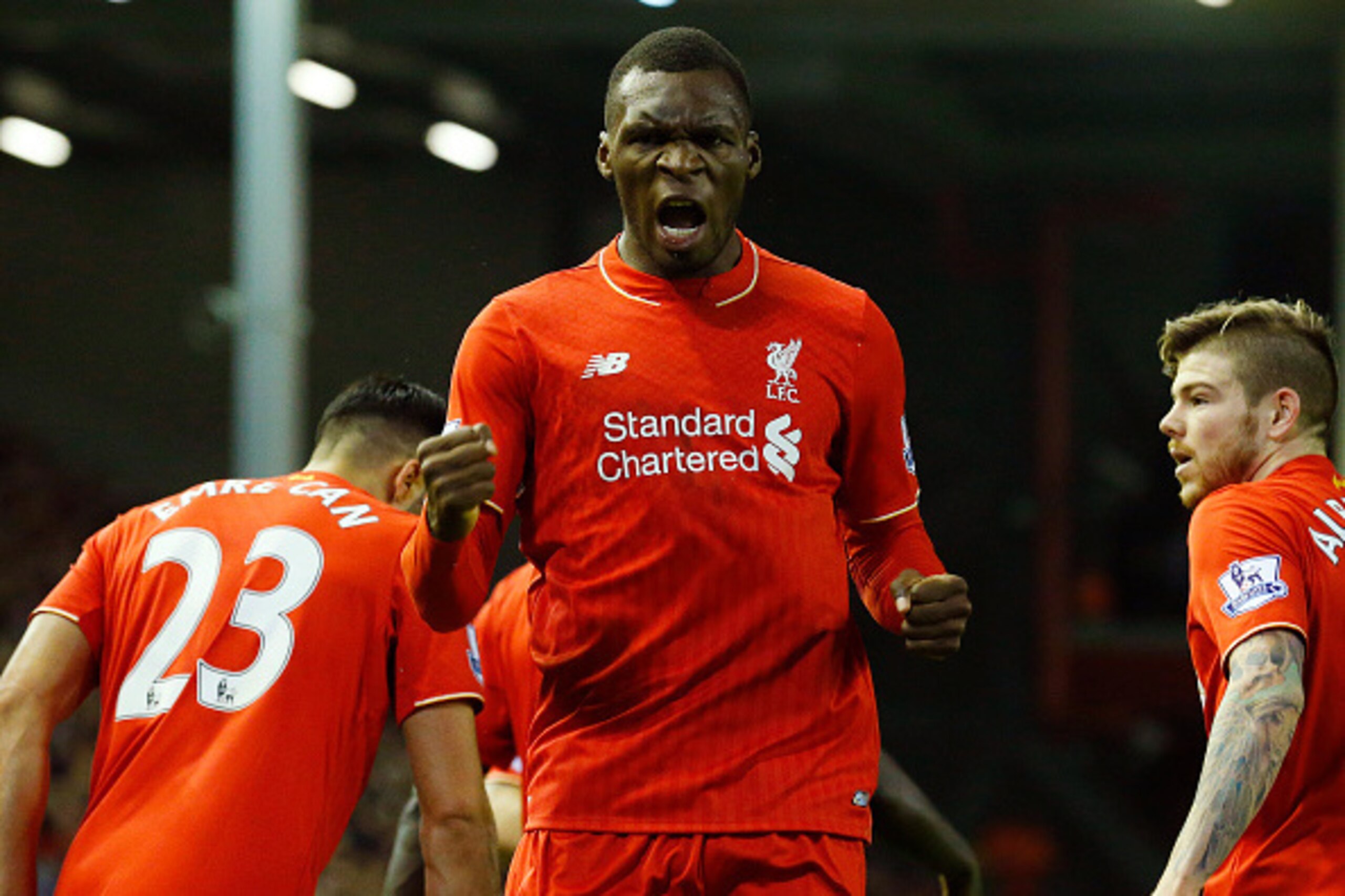 Liverpool's Zaire-born Belgian striker Christian Benteke (C) celebrates scoring the opening goal of during the English Premier League football match between Liverpool and Leicester City at the Anfield stadium in Liverpool, north-west England on December 2