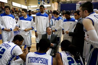 FT. MYERS, FL - JANUARY 25:  Head coach Andy Enfield of the Florida Gulf Coast University Eagles direct his team at a time out against the Stetson Hatters during the game at Alico Arena on January 25, 2013 in Ft. Myers, Florida.  (Photo by J. Meric/Getty 