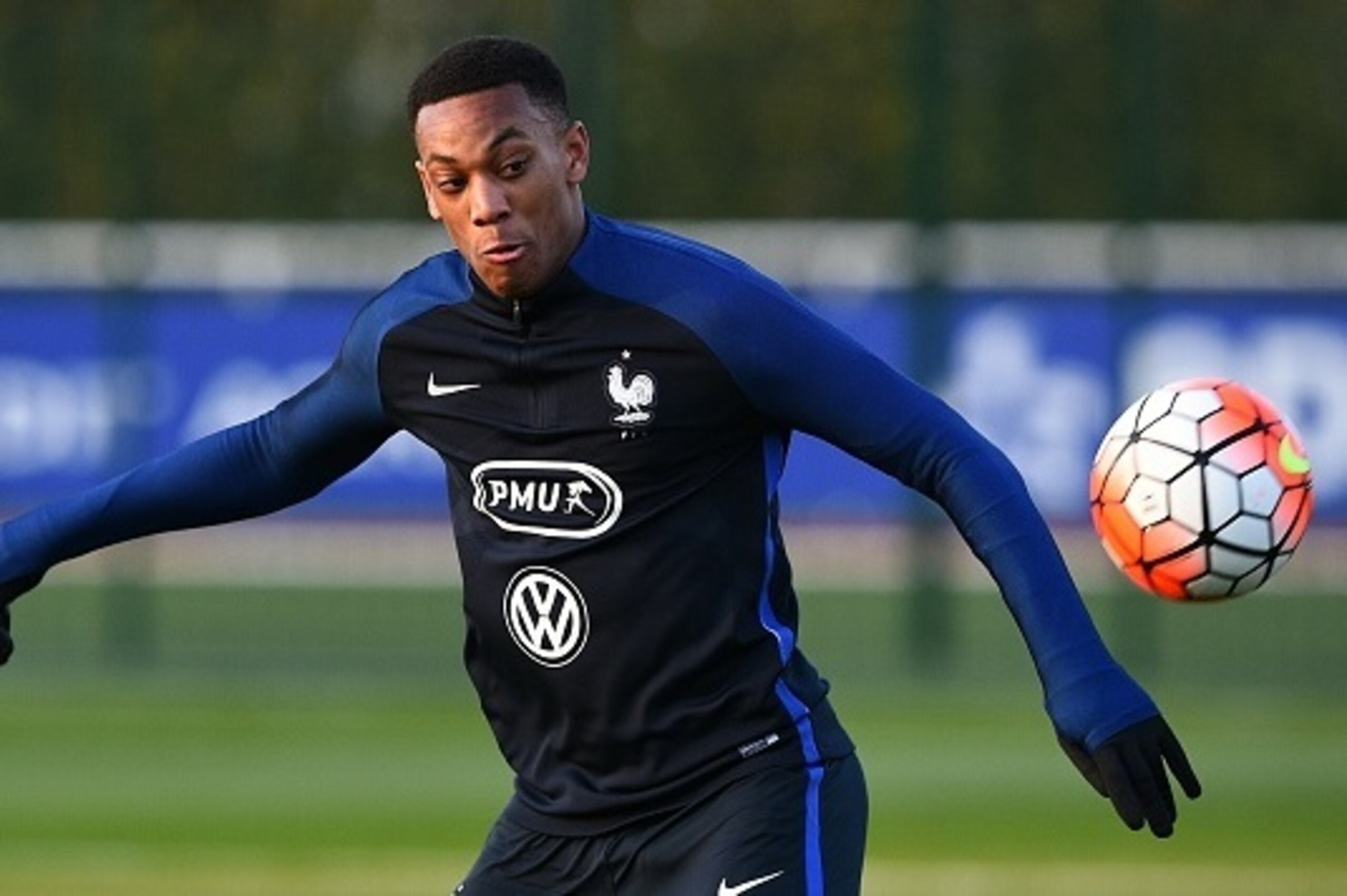 France's forward Anthony Martial controls the ball during a training session in Clairefontaine en Yvelines on March 22, 2016 ahead of the friendly football match against The Netherlands to be held on March  25. / AFP / FRANCK FIFE        (Photo credit sho