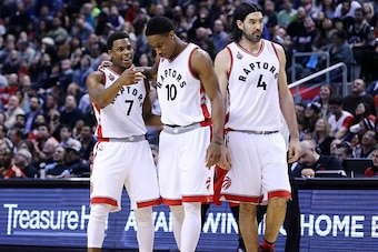 TORONTO, ON - MARCH 06:  Kyle Lowry #7 and DeMar DeRozan #10 of the Toronto Raptors talk during the first half of an NBA game against the Houston Rockets at the Air Canada Centre on March 06, 2016 in Toronto, Ontario, Canada.  NOTE TO USER: User expressly