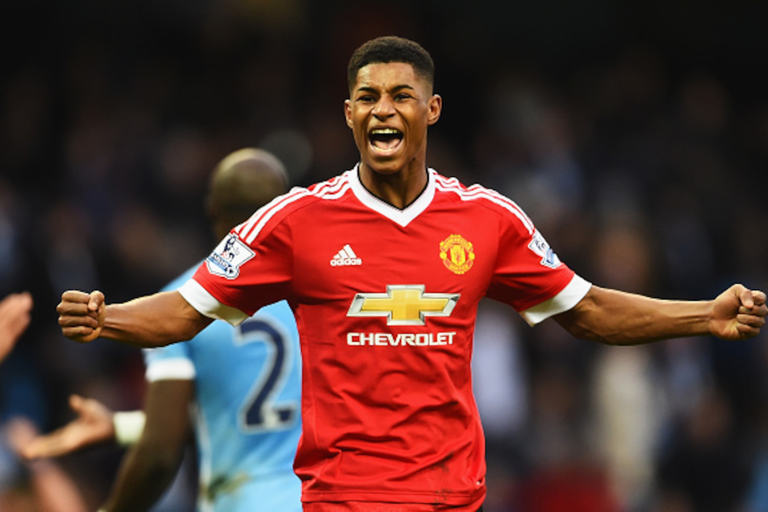 MANCHESTER, ENGLAND - MARCH 20:  Winning goalscorer Marcus Rashford of Manchester United celebrates victory after the Barclays Premier League match between Manchester City and Manchester United at Etihad Stadium on March 20, 2016 in Manchester, United Kin