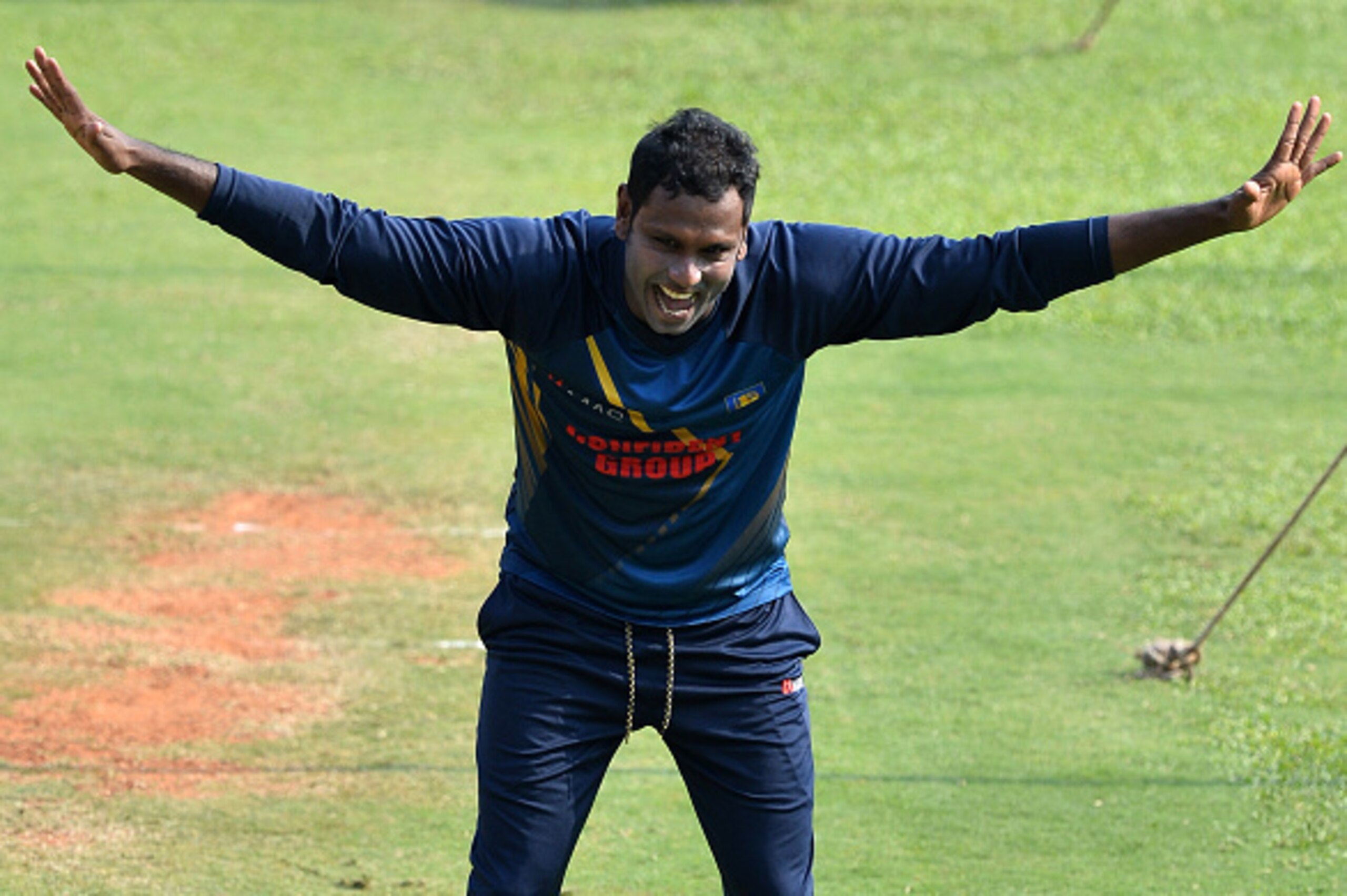 Sri Lankan cricket team captain Angelo Mathews reacts during a team practice session at The Chinnaswamy Stadium in Bangalore on March 19, 2016, on the eve of their World T20 cricket tournament match against West Indies. / AFP / Kiran MANJUNATH (Pho Sri Lankan cricket team captain Angelo Mathews reacts during a team practice session at The Chinnaswamy Stadium in Bangalore on March 19, 2016, on the eve of their World T20 cricket tournament match against West Indies. / AFP / Kiran MANJUNATH (Pho