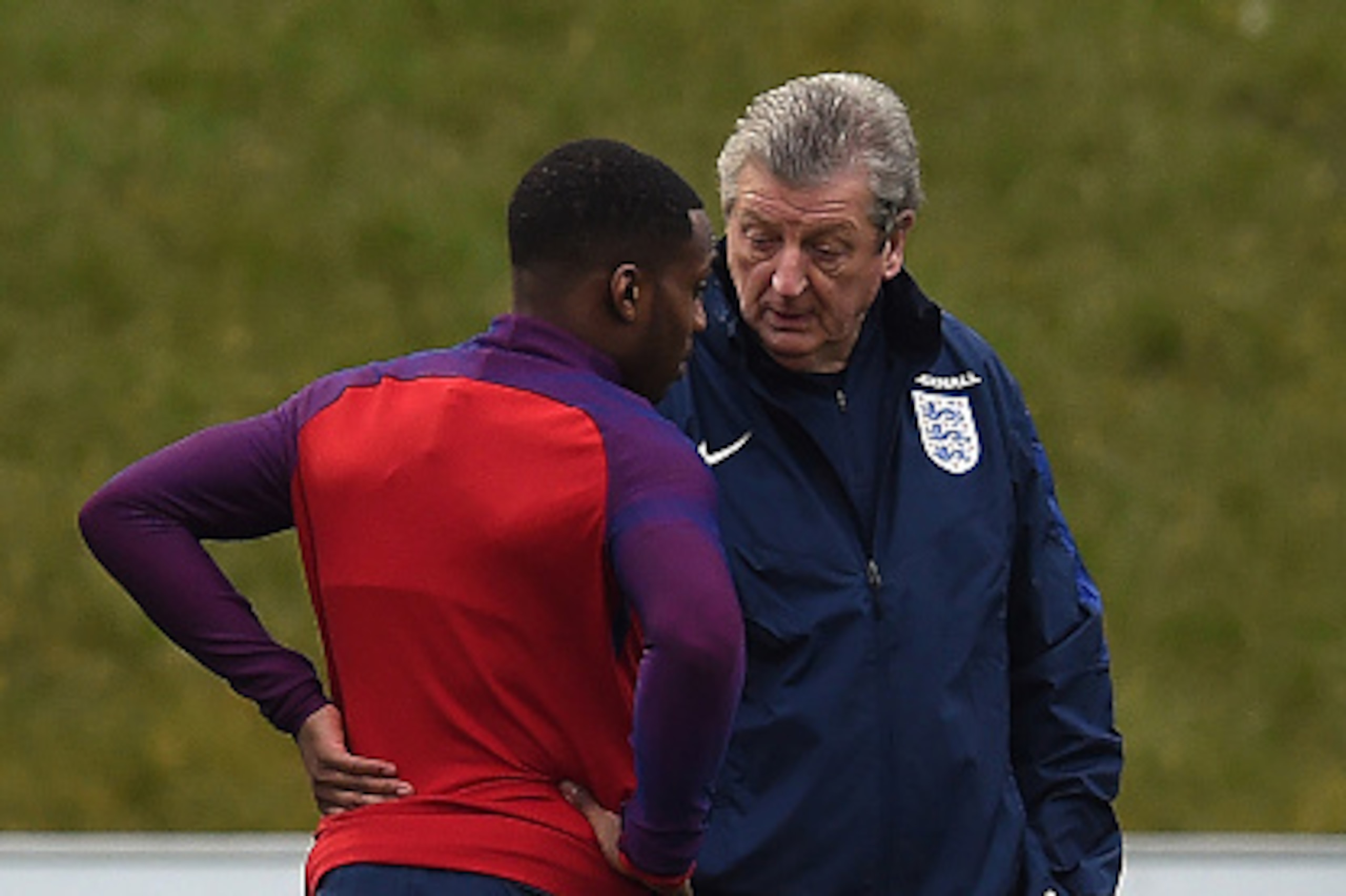 England manager Roy Hodgson (R) talks to defender Danny Rose during a training at St George's Park in Burton-on-Trent, central England on March 22, 2016.
England play world champions Germany in Berlin on March 26, before taking on the Netherlands at Wembl