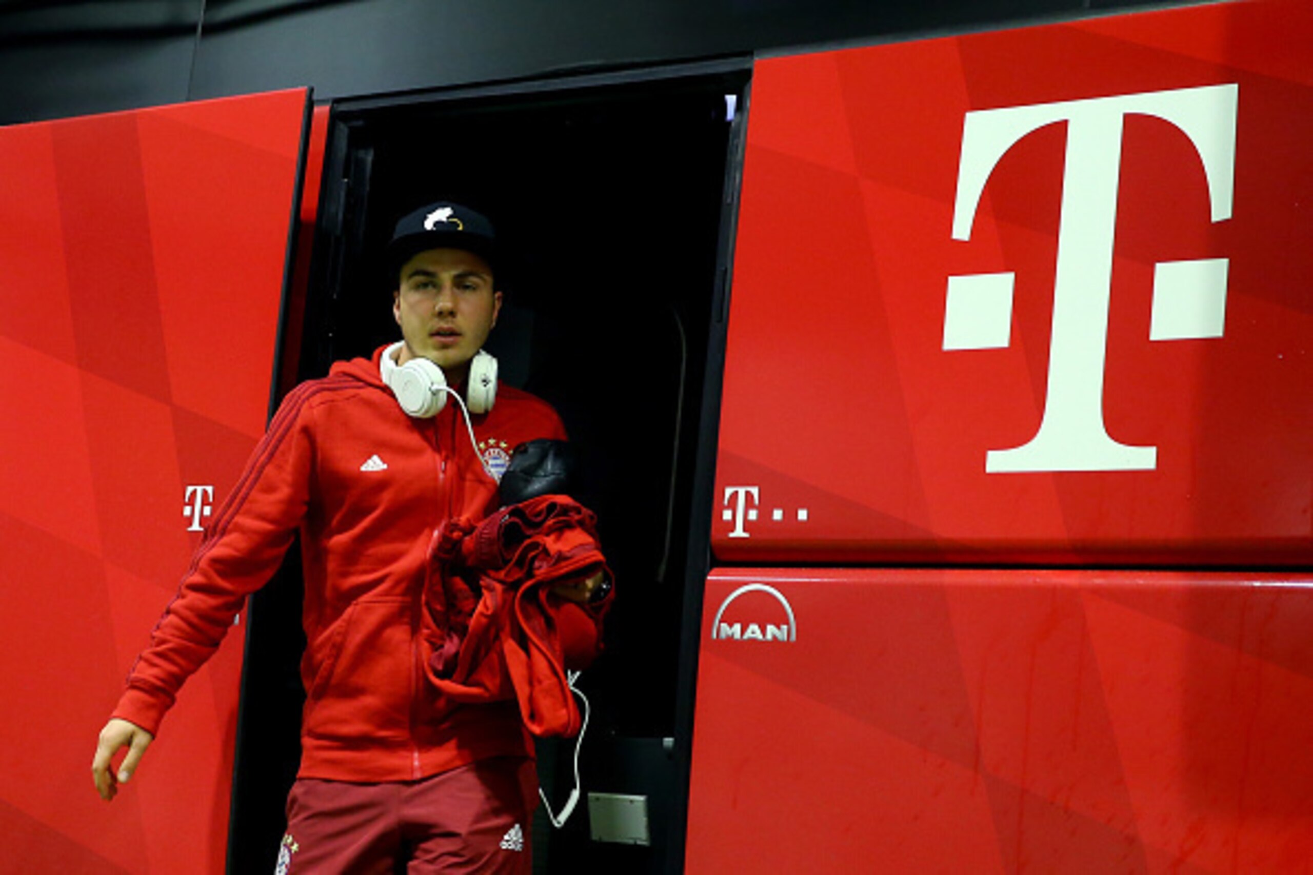 DORTMUND, GERMANY - MARCH 05: Mario Goetze of Bayern leaves the bus prior to the Bundesliga match between Borussia Dortmund and FC Bayern Muenchen at Signal Iduna Park on March 5, 2016 in Dortmund, Germany.  (Photo by Christof Koepsel/Getty Images  For MA