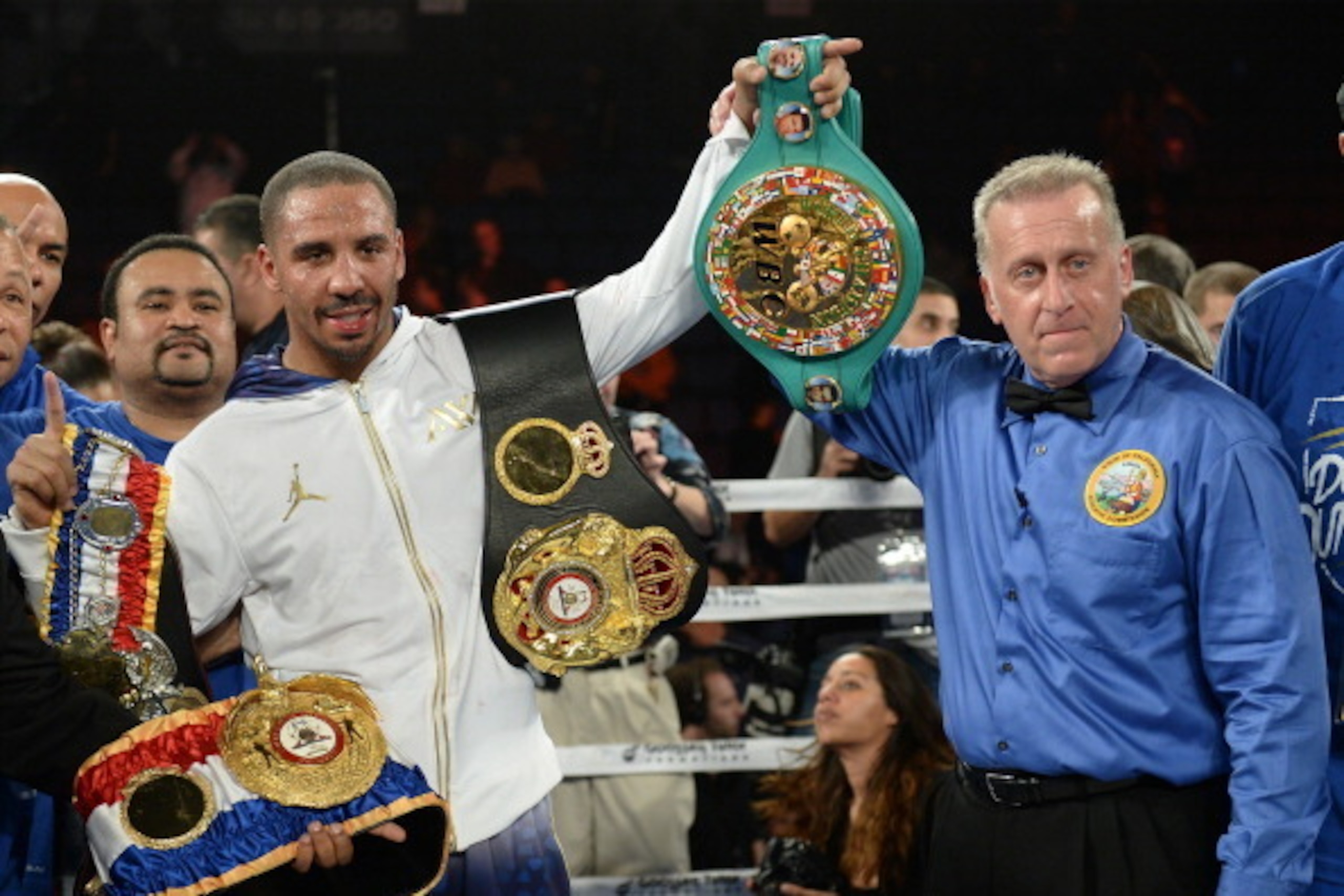 ONTARIO, CA - NOVEMBER 16:  Andre Ward poses with his belts and referee Jack Reiss after defeating Edwin Rodriguez for the WBA super middleweight championsip at Citizens Business Bank Arena on November 16, 2013 in Ontario, California.  (Photo by Harry How