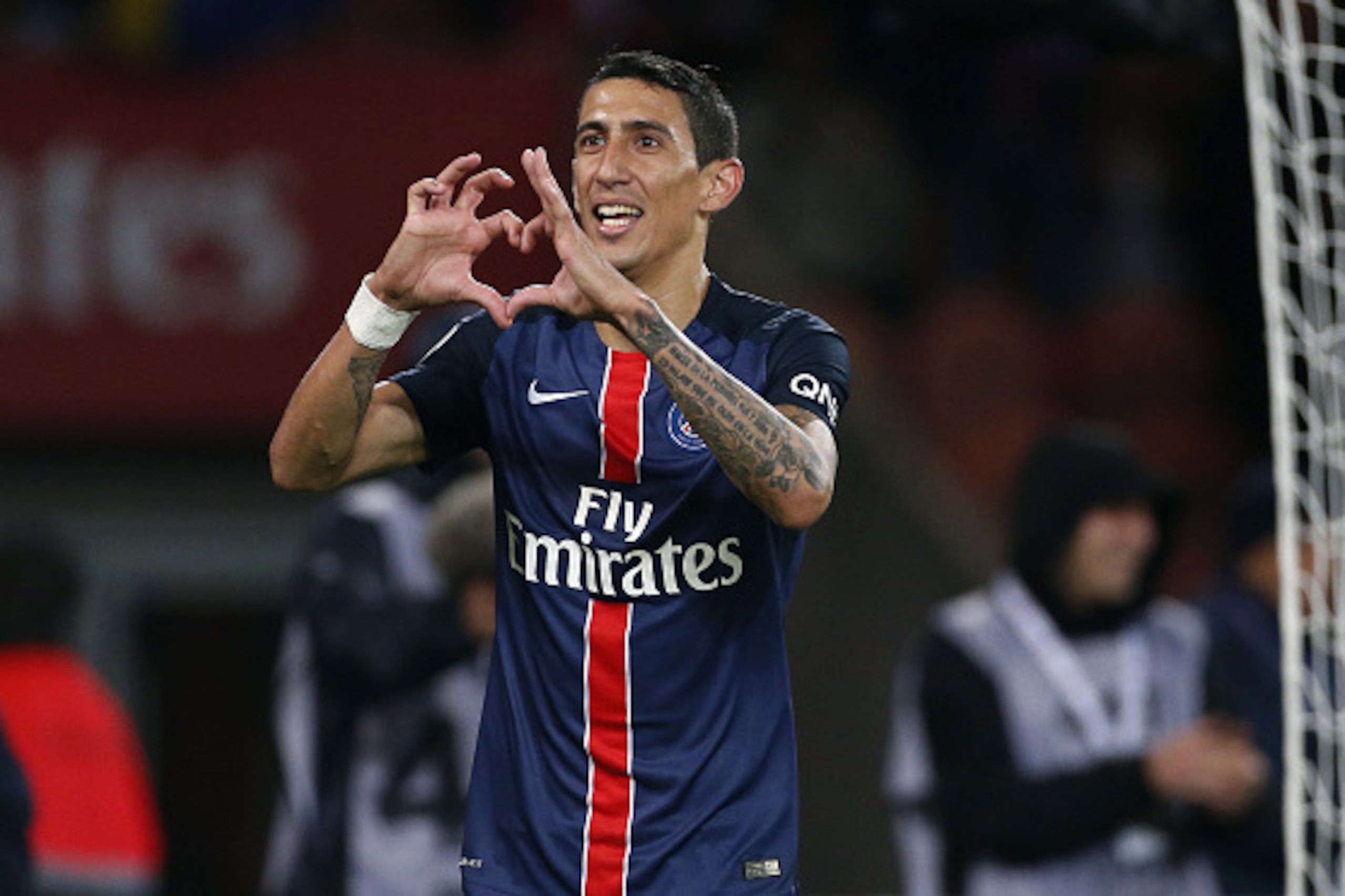 PARIS, FRANCE - SEPTEMBER 22: Angel Di Maria of PSG celebrates his first goal in Ligue 1 during the French Ligue 1 match between Paris Saint-Germain FC (PSG) and EA Guingamp at Parc des Princes stadium on September 22, 2015 in Paris, France. (Photo by Jea