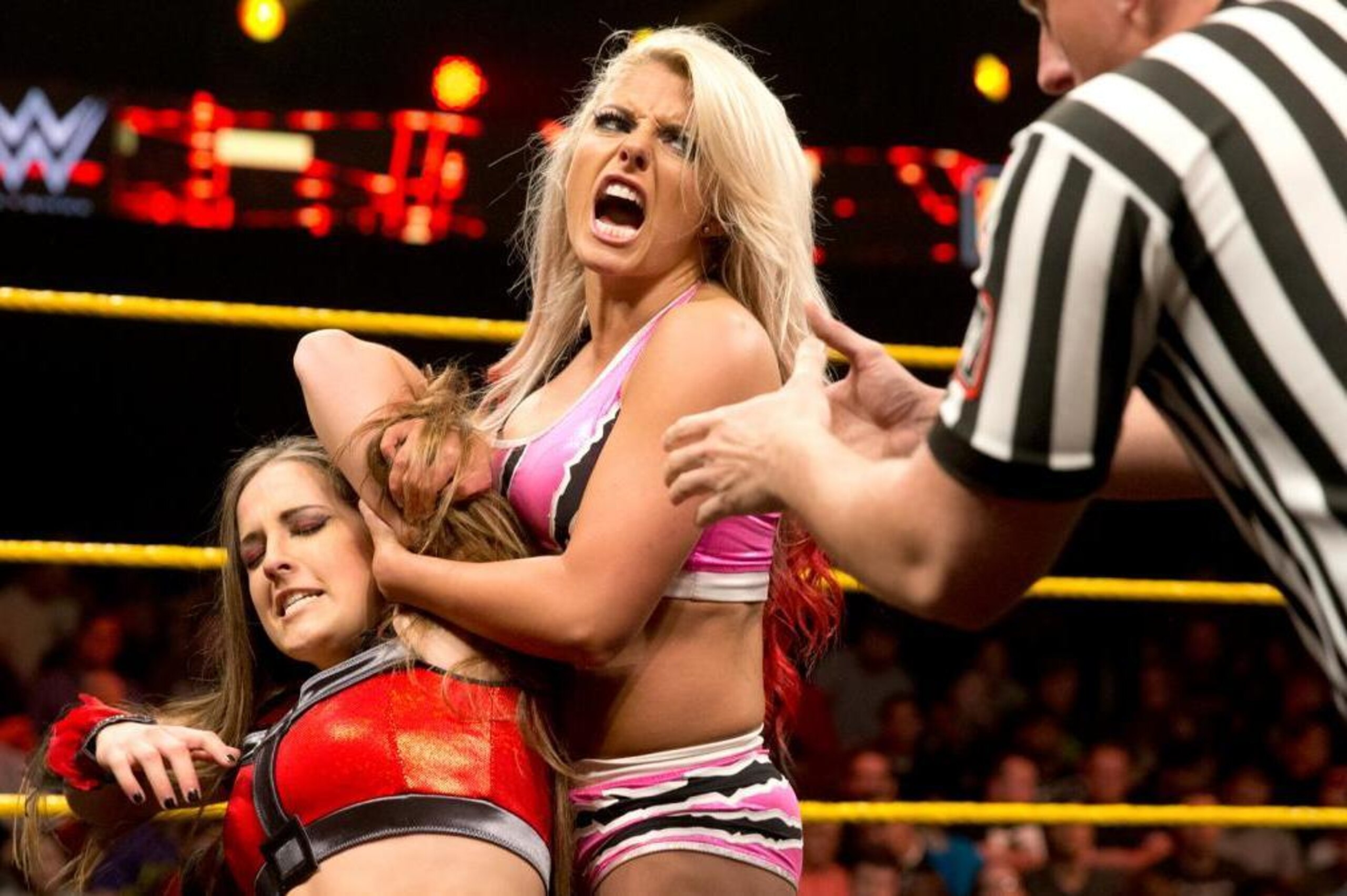 Alexa Bliss in control of Sarah Dobson.