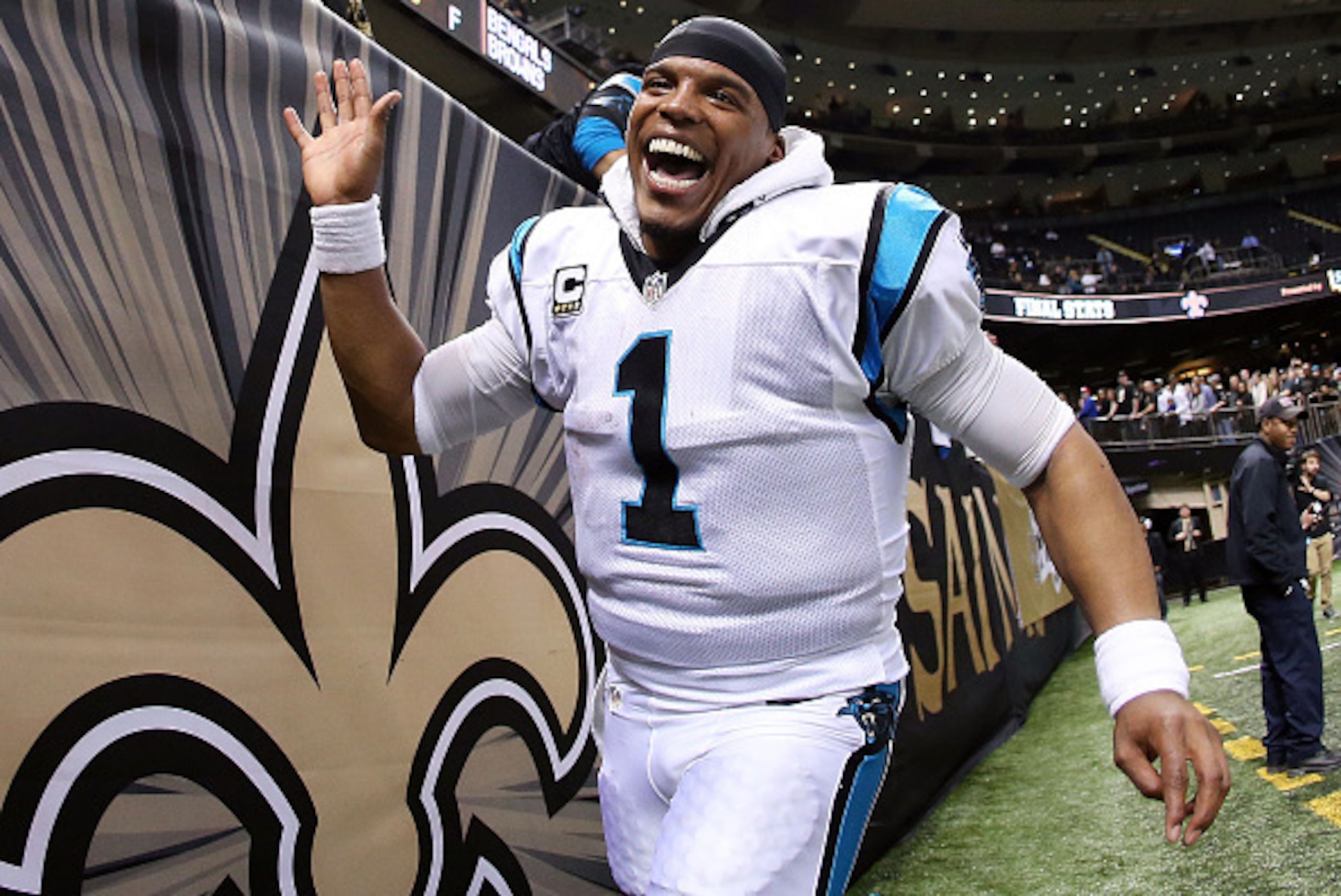 NEW ORLEANS, LA - DECEMBER 06:  Cam Newton #1 of the Carolina Panthers celebrates with fans after his team defeated the New Orleans Saints 41-38 at the Mercedes-Benz Superdome on December 6, 2015 in New Orleans, Louisiana.  (Photo by Sean Gardner/Getty Im