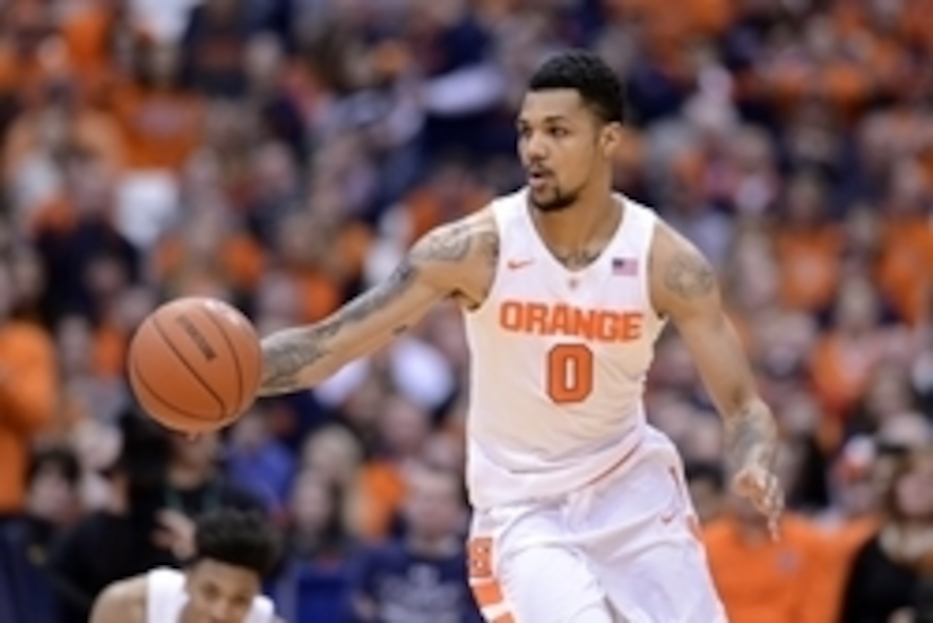 Feb 11, 2016; Syracuse, NY, USA; Syracuse Orange forward Michael Gbinije (0) brings the ball up court during the second half of a game against the Florida State Seminoles at the Carrier Dome.Syracuse won 85-72. Mandatory Credit: Mark Konezny-USA TODAY S Feb 11, 2016; Syracuse, NY, USA; Syracuse Orange forward Michael Gbinije (0) brings the ball up court during the second half of a game against the Florida State Seminoles at the Carrier Dome.Syracuse won 85-72. Mandatory Credit: Mark Konezny-USA TODAY S
