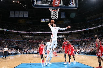OKLAHOMA CITY, OK - MARCH 22:  Russell Westbrook #0 of the Oklahoma City Thunder goes to the basket against the Houston Rockets on March 22, 2016 at Chesapeake Energy Arena in Oklahoma City, Oklahoma. NOTE TO USER: User expressly acknowledges and agrees t
