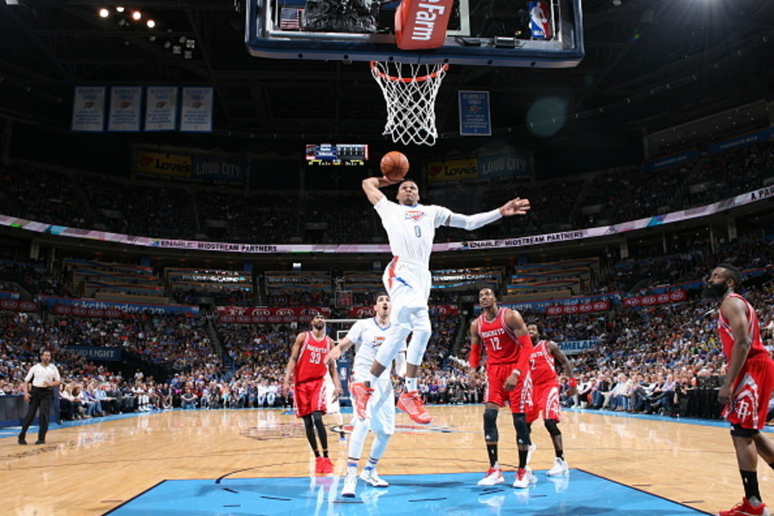 OKLAHOMA CITY, OK - MARCH 22:  Russell Westbrook #0 of the Oklahoma City Thunder goes to the basket against the Houston Rockets on March 22, 2016 at Chesapeake Energy Arena in Oklahoma City, Oklahoma. NOTE TO USER: User expressly acknowledges and agrees t