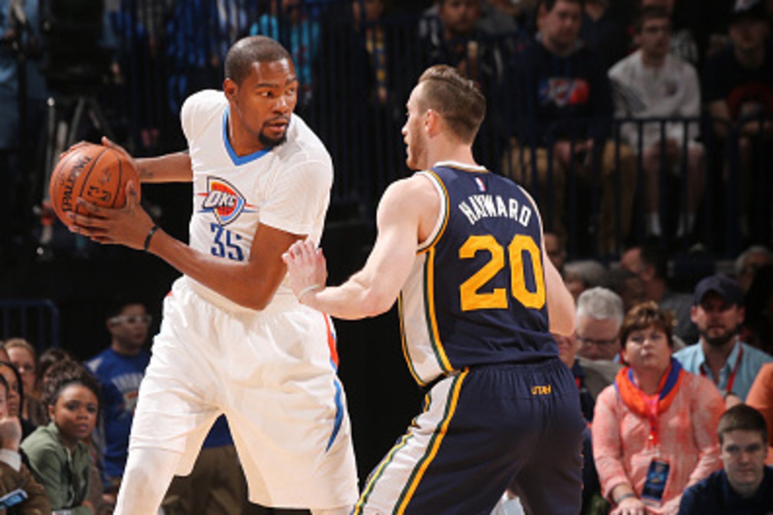 OKLAHOMA CITY, OK  - MARCH 24: Kevin Durant #35 of the Oklahoma City Thunder defends the ball against Gordon Hayward #20 of the Utah Jazz during the game on March 24, 2016 at Chesapeake Energy Arena in Oklahoma City, Oklahoma. NOTE TO USER: User expressly