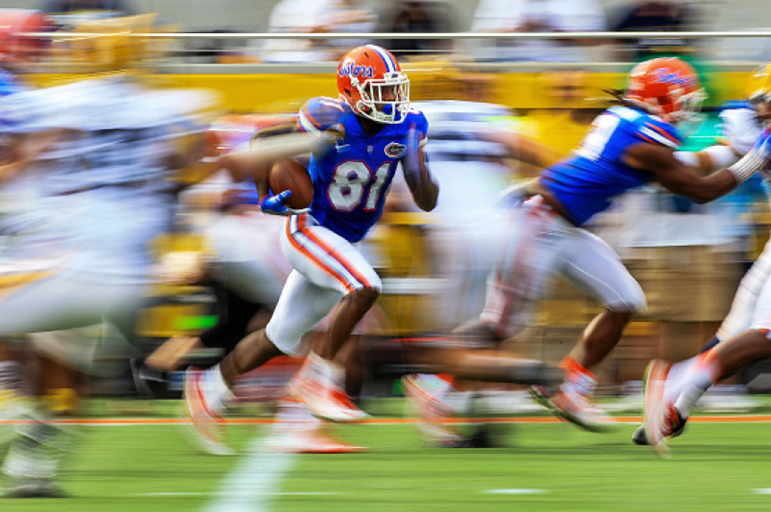 ORLANDO, FL - JANUARY 01: Antonio Callaway #81 of the Florida Gators rushes during the first half of the Buffalo Wild Wings Citrus Bowl game against the Michigan Wolverines at Orlando Citrus Bowl on January 1, 2016 in Orlando, Florida.  (Photo by Rob Fold