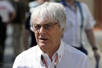 Formula 1 boss  Bernie Ecclestone walks in the paddock before the first practice session at the Yas Marina circuit in Abu Dhabi on November 27, 2015 ahead of the Abu Dhabi Formula One Grand Prix.  AFP PHOTO / TOM GANDOLFINI / AFP / Tom Gandolfini        (