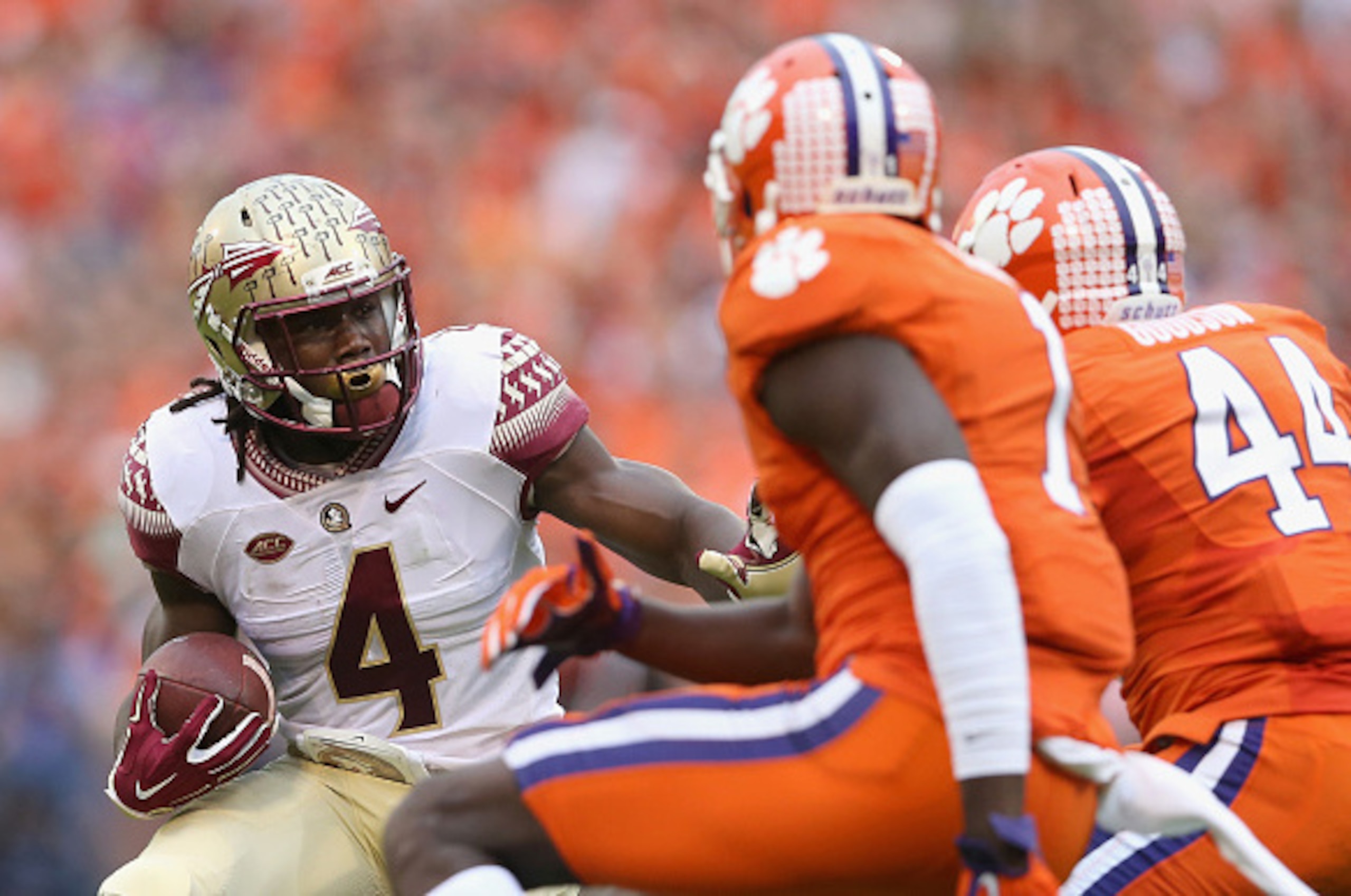 CLEMSON, SC - NOVEMBER 07:  Dalvin Cook #4 of the Florida State Seminoles runs with the ball against the Clemson Tigers during their game at Memorial Stadium on November 7, 2015 in Clemson, South Carolina.  (Photo by Streeter Lecka/Getty Images)