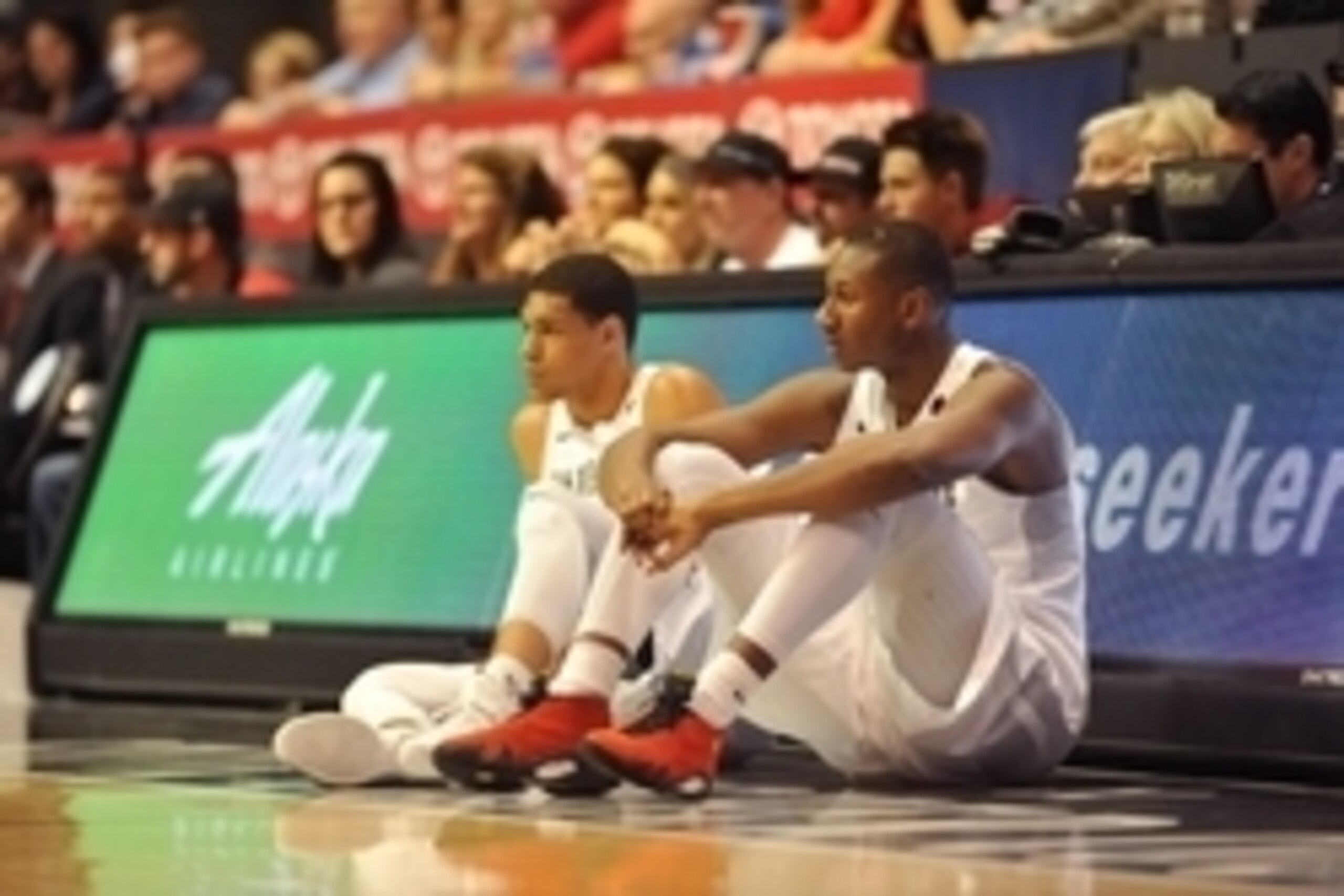 Mar 5, 2016; San Diego, CA, USA; San Diego State Aztecs guard Trey Kell (left) and forward Skylar Spencer (right) await a substitution during the game against the UNLV Rebels at Viejas Arena at Aztec Bowl. The Aztecs won 92-56. Mandatory Credit: Orlando R