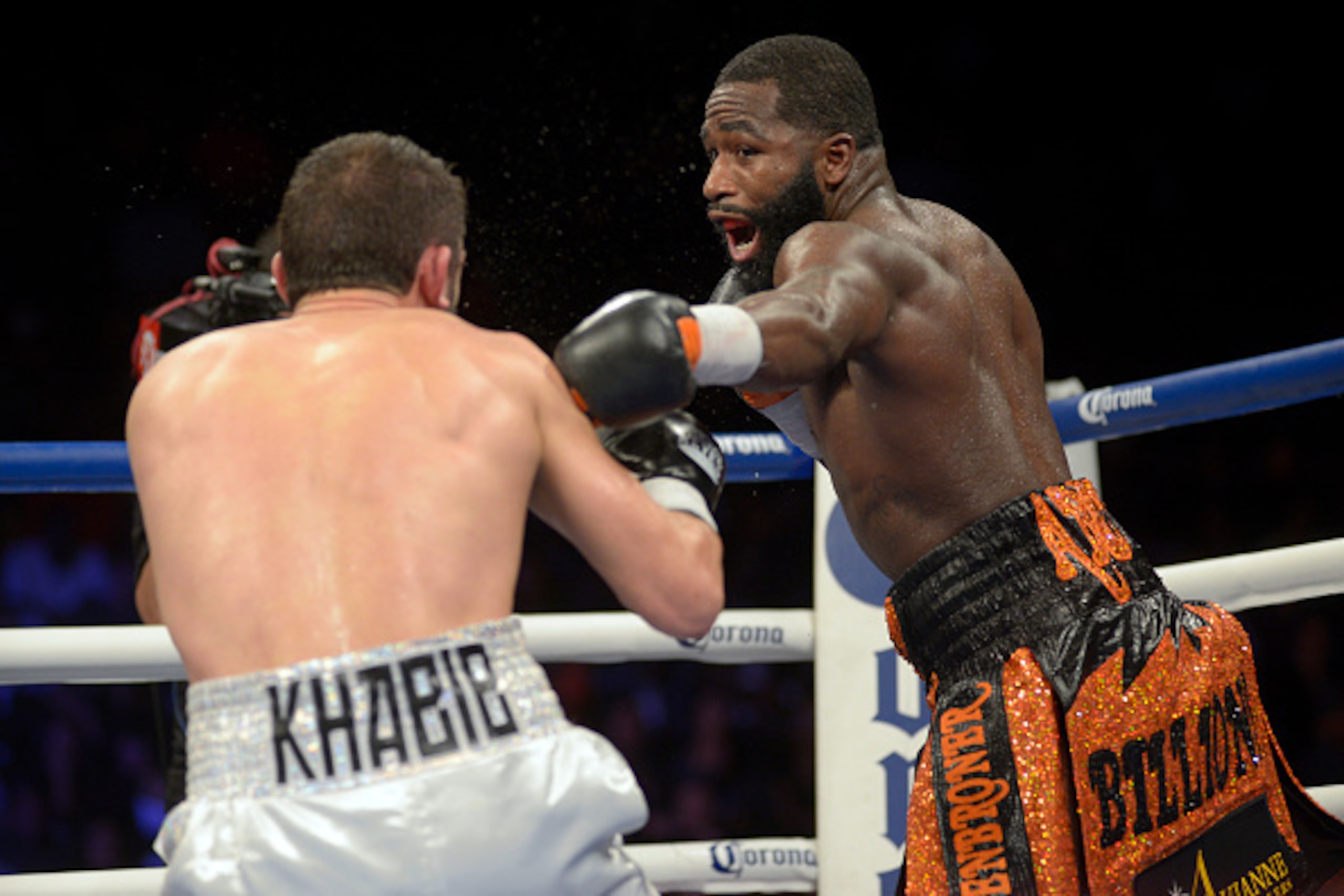 CINCINNATI, OHIO - OCTOBER 03: Adrien Broner, right, takes a swing at Khabib Allakhverdiev during a fight at U.S. Bank Arena on October 4, 2015 in Cincinnati, Ohio. (Photo by Dylan Buell/Getty Images)