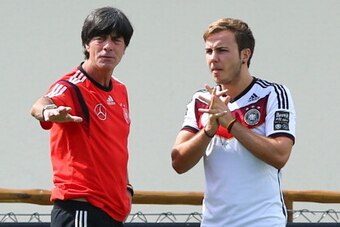 SANTO ANDRE, BRAZIL - JULY 05:  Joachim Loew (L), head coach of Germany tlks to Mario Goetze during the German national team training at Campo Bahia on July 5, 2014 in Santo Andre, Brazil.  (Photo by Martin Rose/Getty Images)