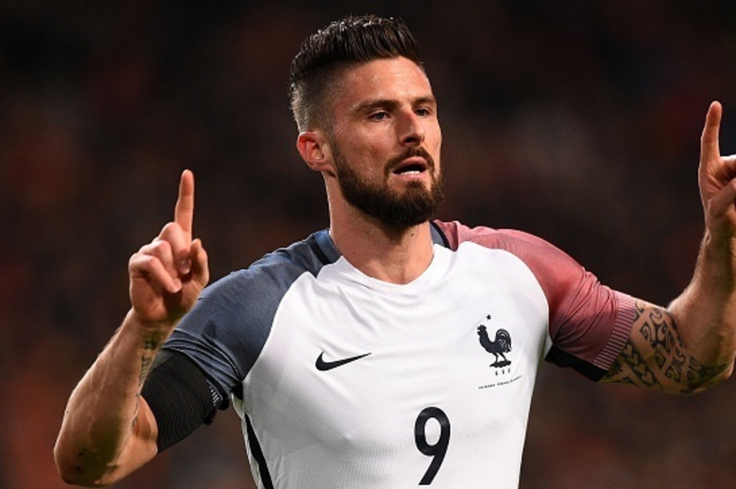 France's forward Olivier Giroud celebrates after scoring a goal  during the friendly football match between the Netherlands and France at the Amsterdam ArenA, on March 25, 2016, in Amsterdam. AFP PHOTO / FRANCK FIFE / AFP / FRANCK FIFE        (Photo credi