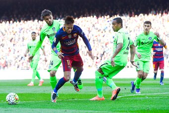BARCELONA, SPAIN - MARCH 12:  Neymar of FC Barcelona is brought down by Pedro Leon (L) of Getafe CF during the La Liga match between FC Barcelona and Getafe CF at Camp Nou on March 12, 2016 in Barcelona, Spain.  (Photo by David Ramos/Getty Images)