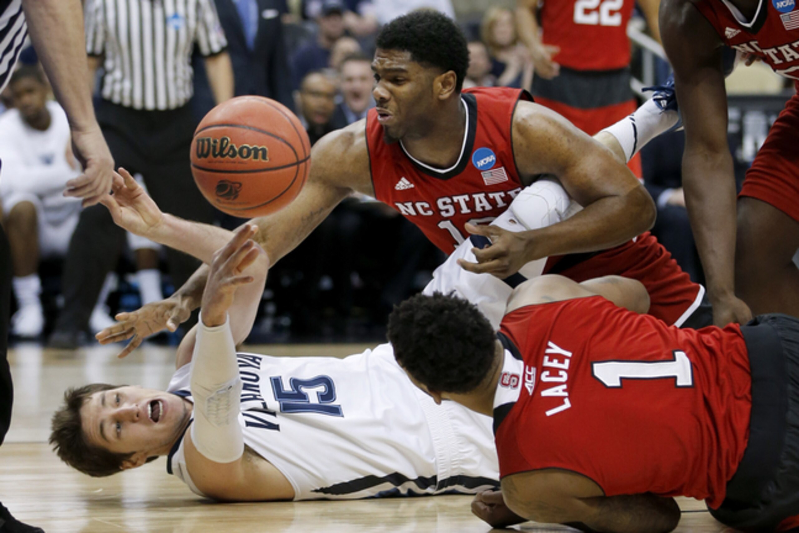 Ryan Arcidiacono swarmed by Trevor Lacey and NC State.