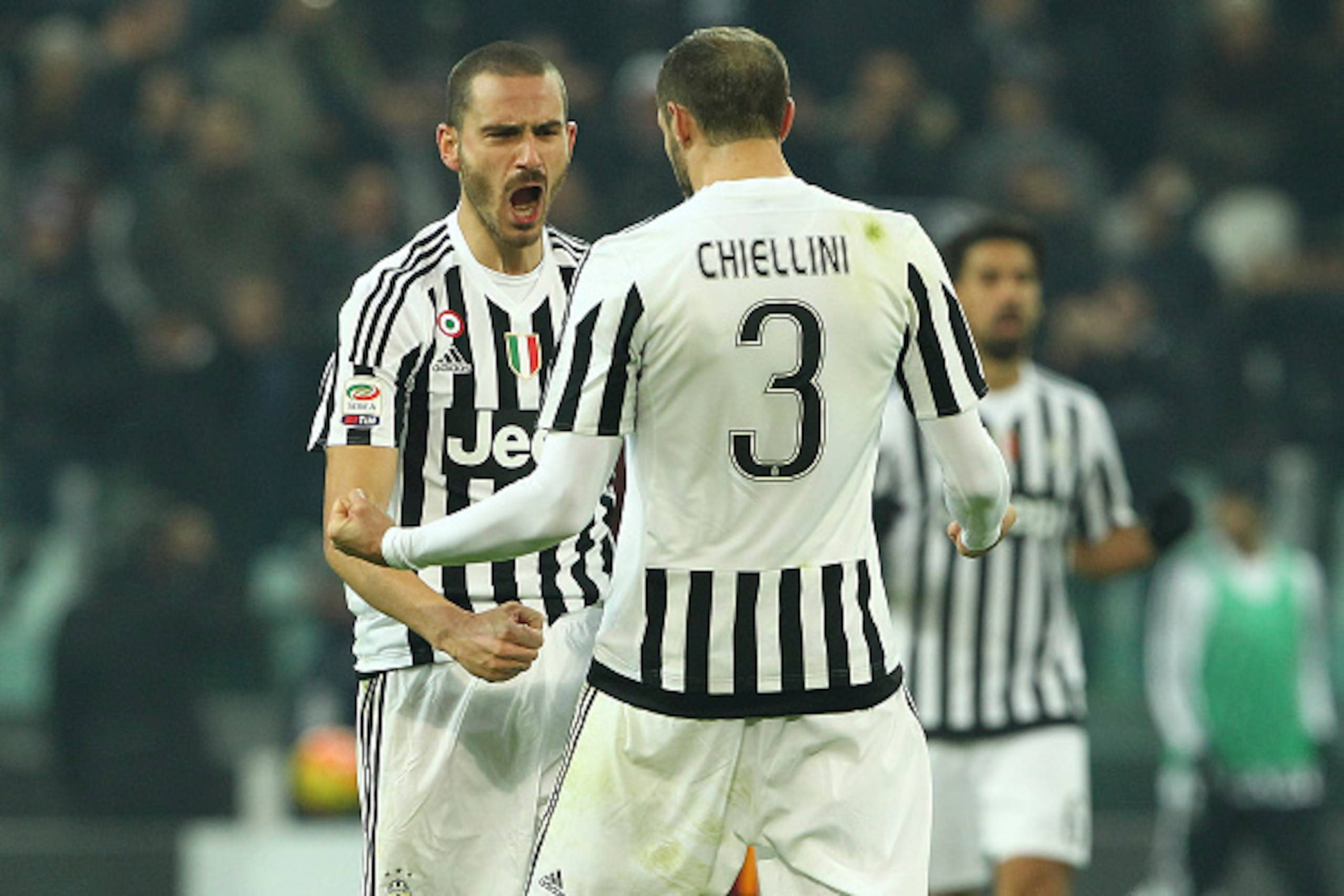 TURIN, ITALY - JANUARY 24:  Leonardo Bonucci and Giorgio Chiellini of Juventus FC celebrate a victory at the end of the Serie A match between Juventus FC and AS Roma at Juventus Arena on January 24, 2016 in Turin, Italy.  (Photo by Marco Luzzani/Getty Ima