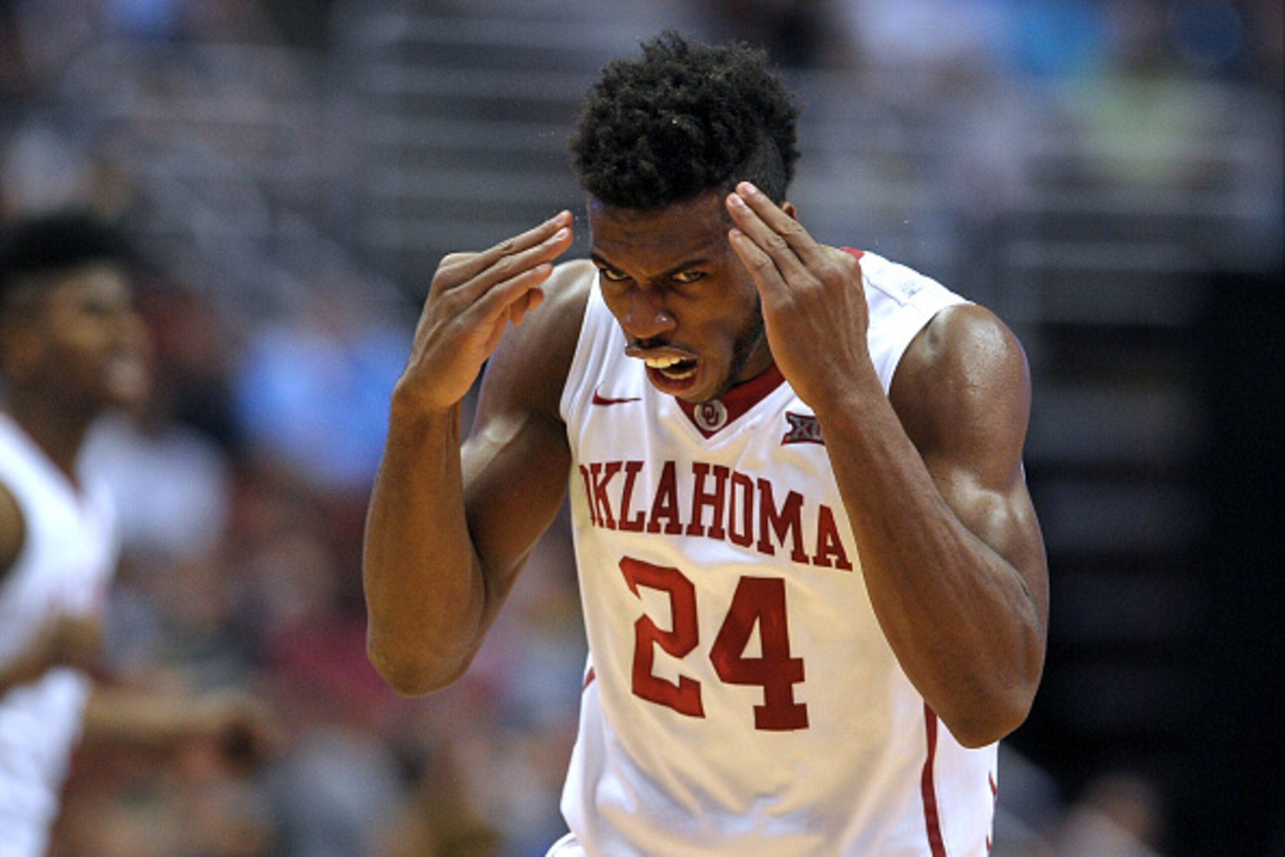 ANAHEIM, CA - MARCH 24: Buddy Hield #24 of the Oklahoma Sooners reacts against the Texas A&M Aggies during the West Regional Semifinal of the 2016 NCAA Men's Basketball Tournament at Honda Center on March 24, 2016 in Anaheim, California. (Photo by Lance K